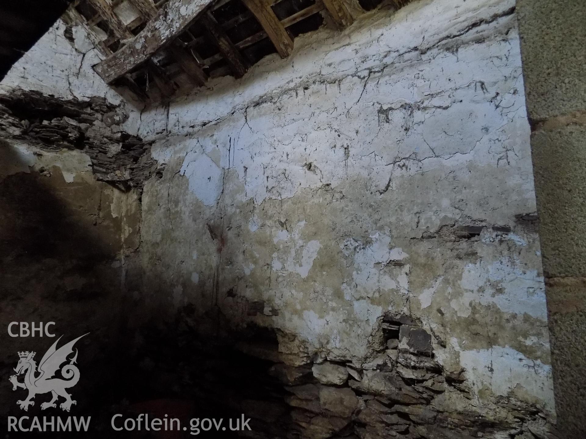 Digital colour photograph showing interior view of internal wall in building attached to Tywyll Nodwydd house, Pennal, dated 2019. Photographed by Mr Gary Coulsby to meet a condition attached to a planning application.