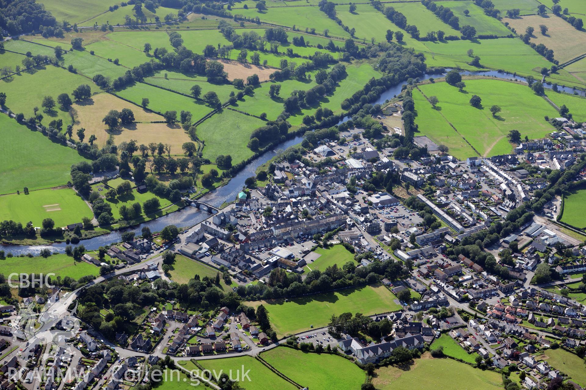 The town of Llanrwst, with Pont Fawr crossing the river Conwy. Oblique aerial photograph taken during the Royal Commission?s programme of archaeological aerial reconnaissance by Toby Driver on 23rd July 2019.