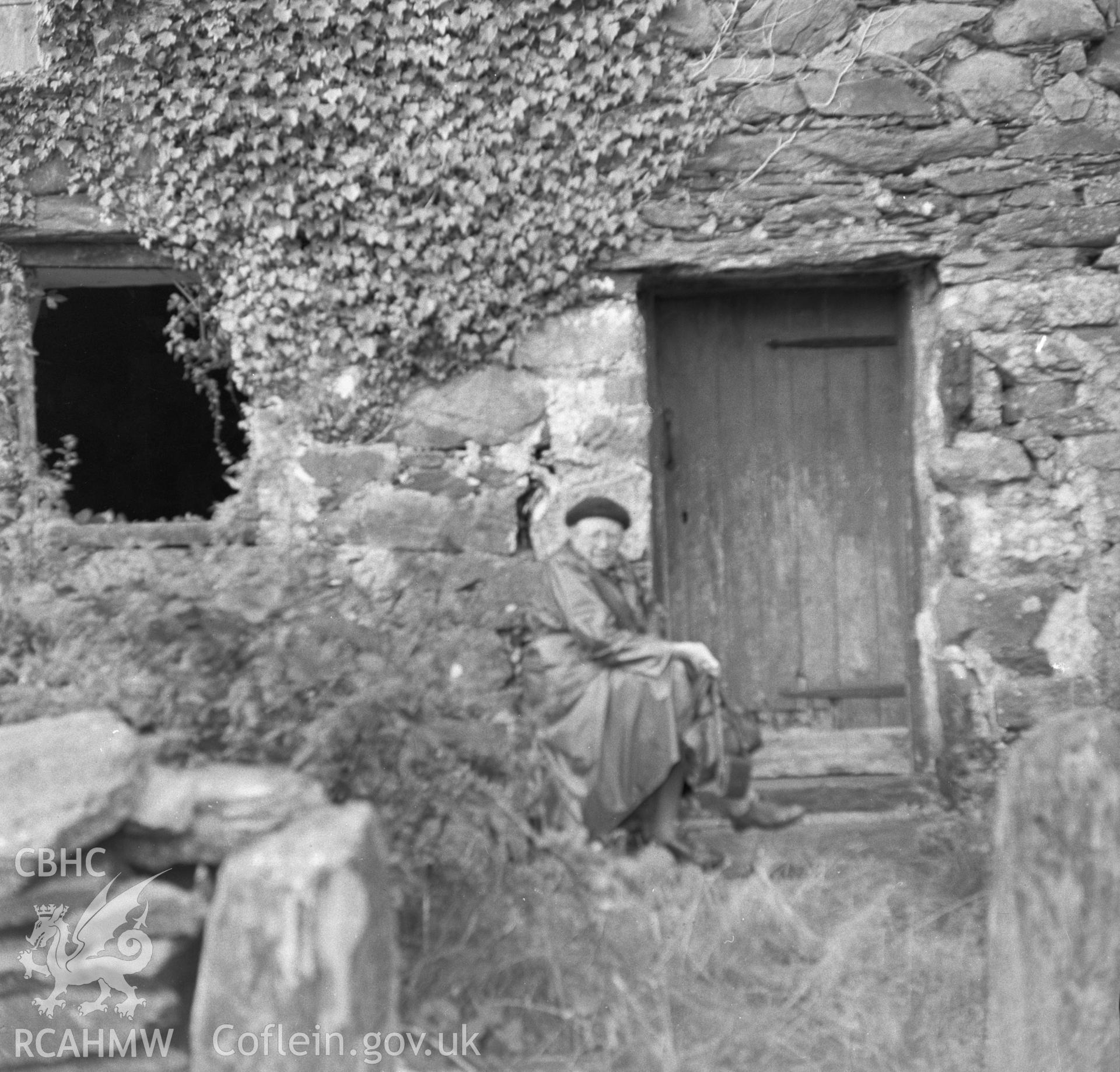 Digital copy of an undated nitrate negative showing a view of the entrance to Coed Mawr with figure.