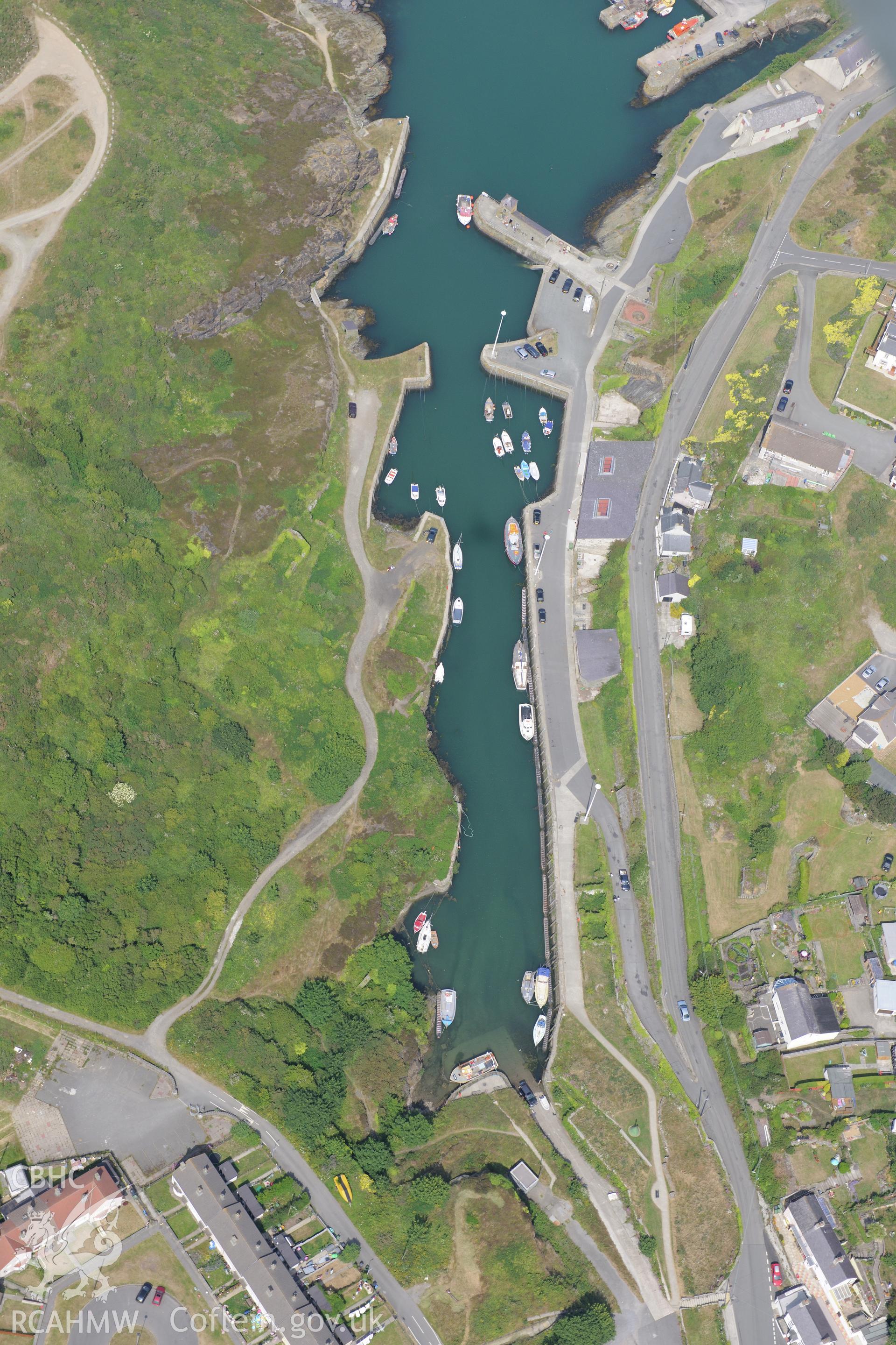 Amlwch harbour, Anglesey. Oblique aerial photograph taken during the Royal Commission?s programme of archaeological aerial reconnaissance by Toby Driver on 12th July 2013.