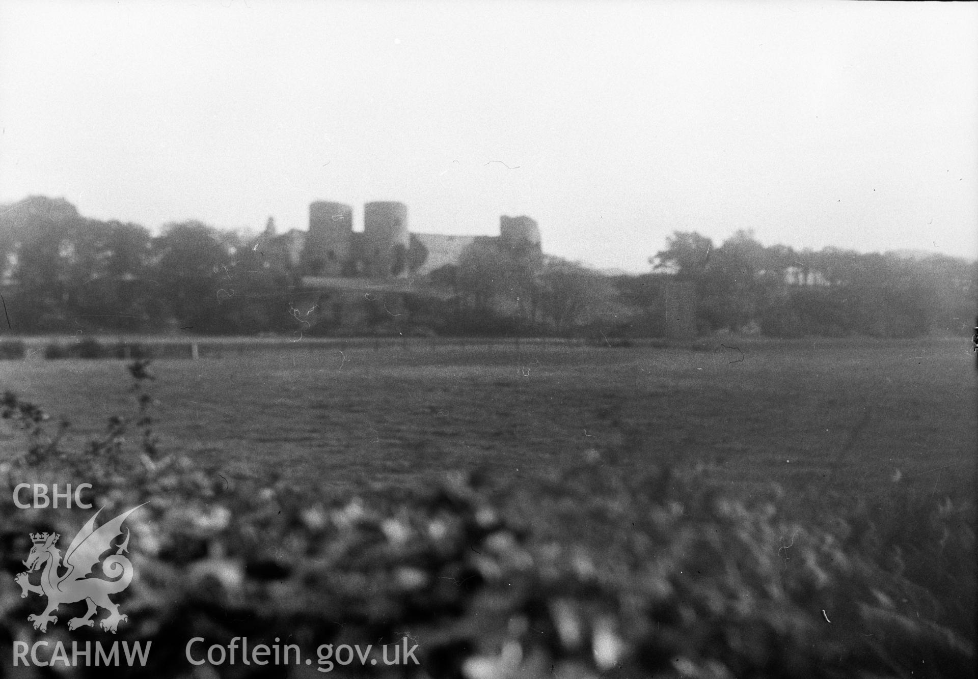 Digital copy of a nitrate negative showing general view of Rhuddlan Castle taken by Leonard Monroe, in 1940s.