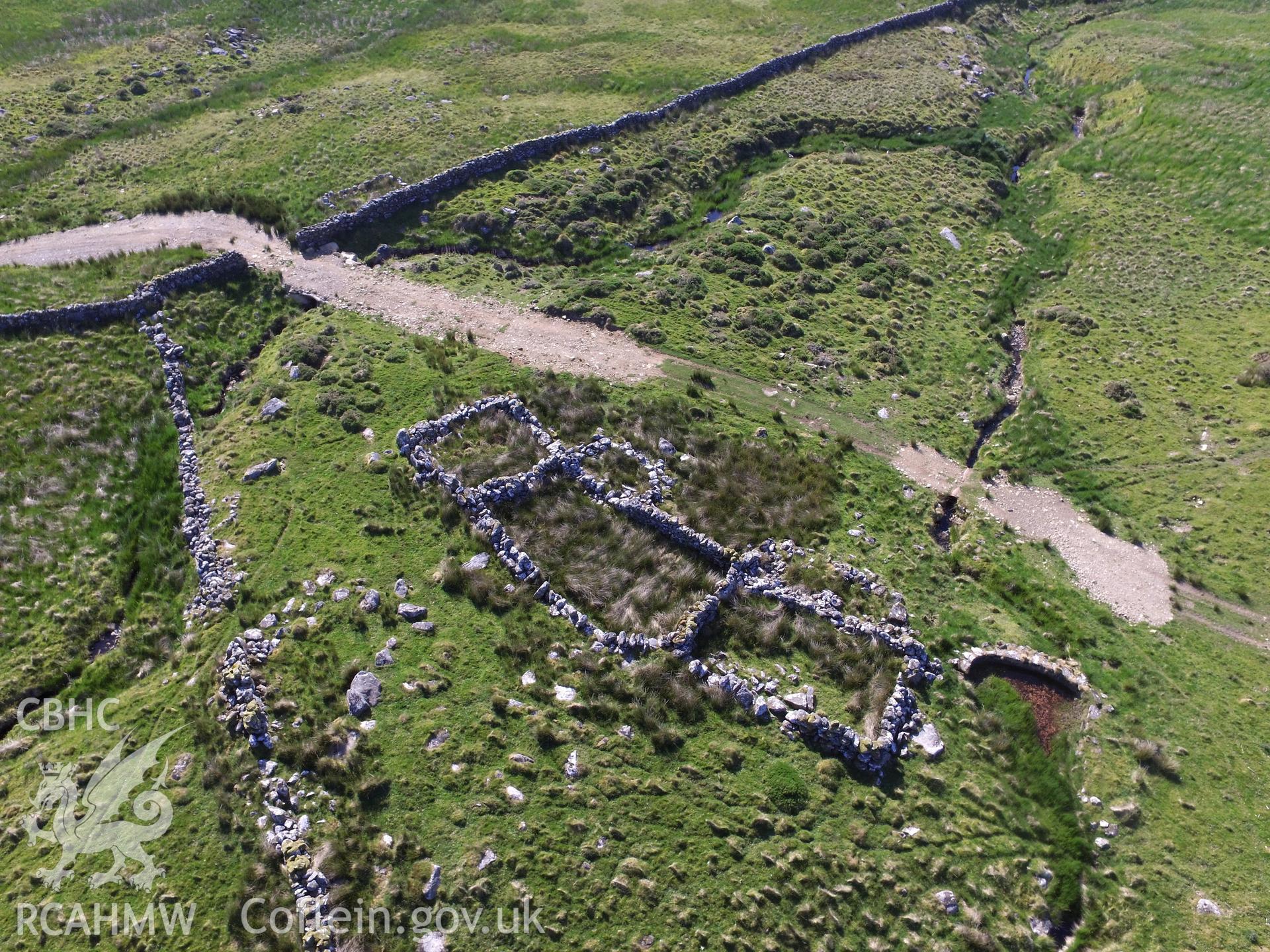 Aerial view of sheepfolds or possible farmstead noth of Cwm Cilio, near Llanaelhaearn, on the Llyn peninsula. Colour photograph taken by Paul R. Davis on 24th June 2018.