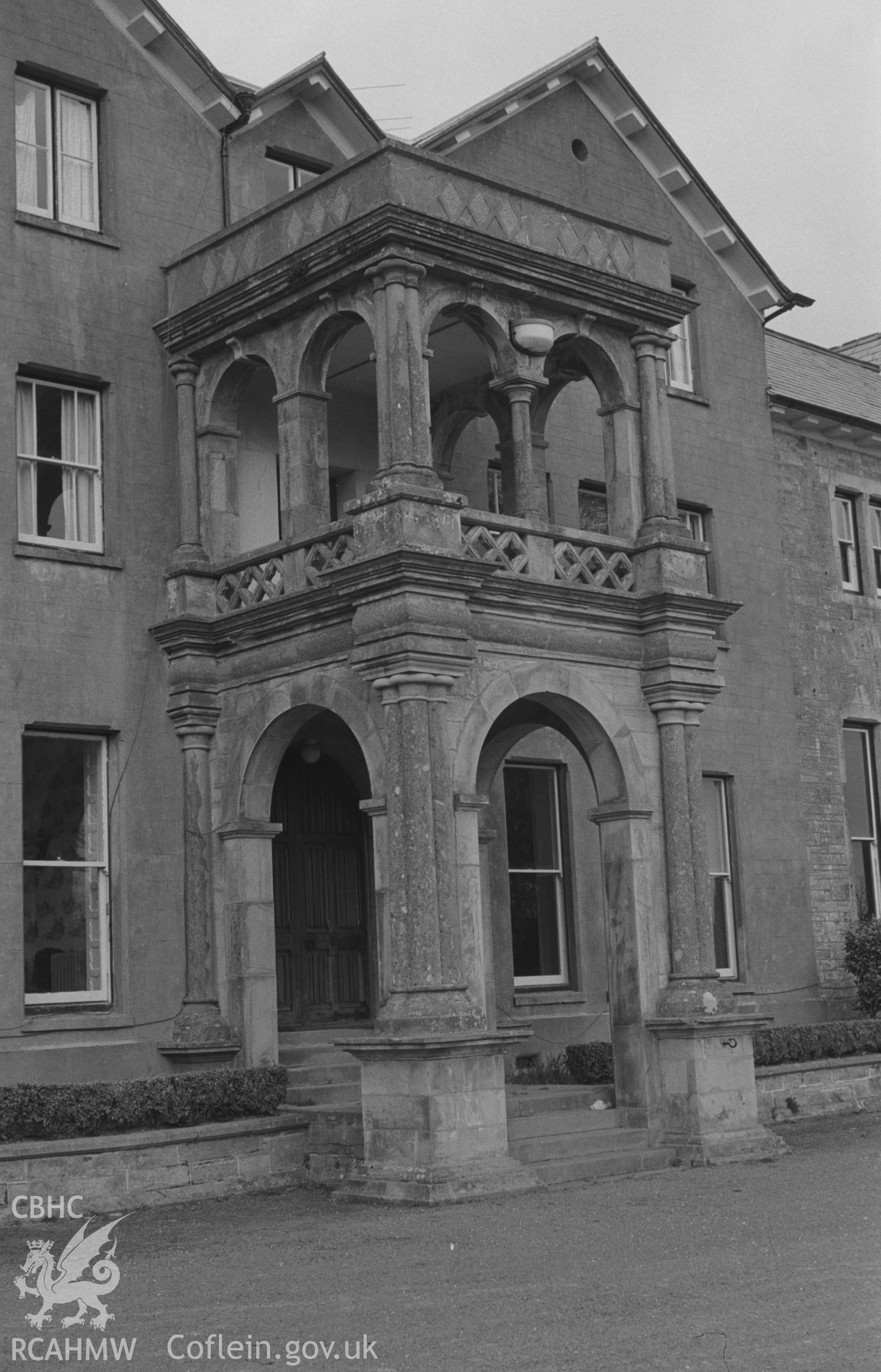 Digital copy of a black and white negative showing the two storied porch over the front door of Highmead House, Llanwenog. Photographed by Arthur O. Chater on 11th April 1967 looking north from Grid Reference SN 502 431.