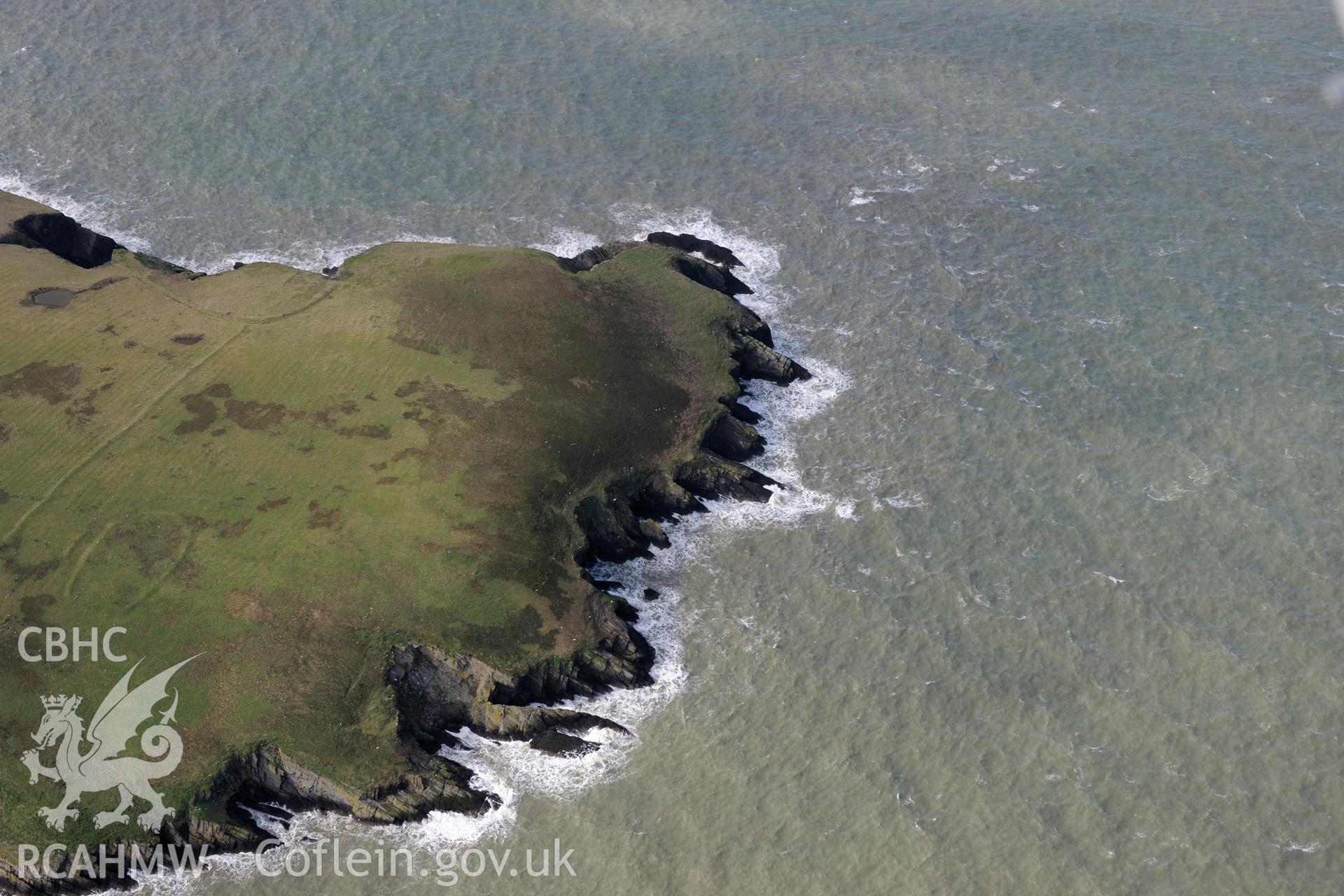 Cardigan Island. From a set of oblique aerial orbital photographs taken for "structure from motion" processing during the Royal Commission's programme of archaeological aerial reconnaissance by Toby Driver on 13th March 2015.