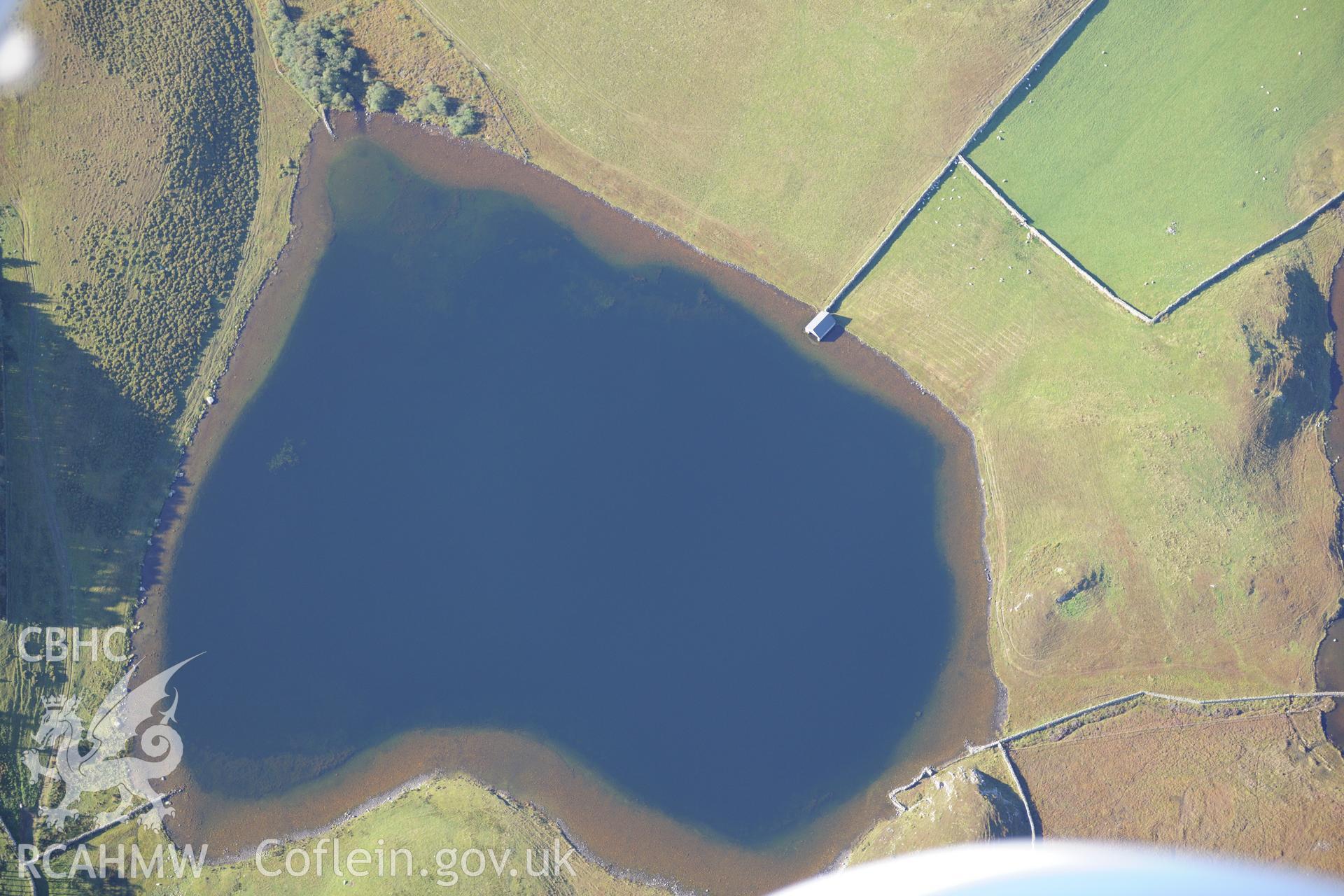 Boathouse on the smaller Llyn Cregennen on the slopes of Cadair Idris. Oblique aerial photograph taken during the Royal Commission's programme of archaeological aerial reconnaissance by Toby Driver on 2nd October 2015.