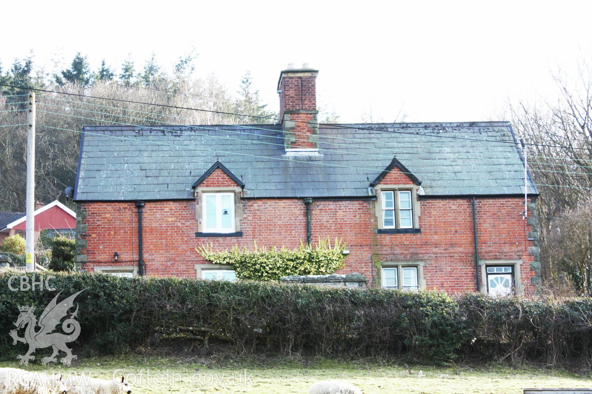 Colour photograph showing red brick exterior of Pentre Cottages, Leighton. Photographed during survey conducted by Geoff Ward on 11th July 2009.