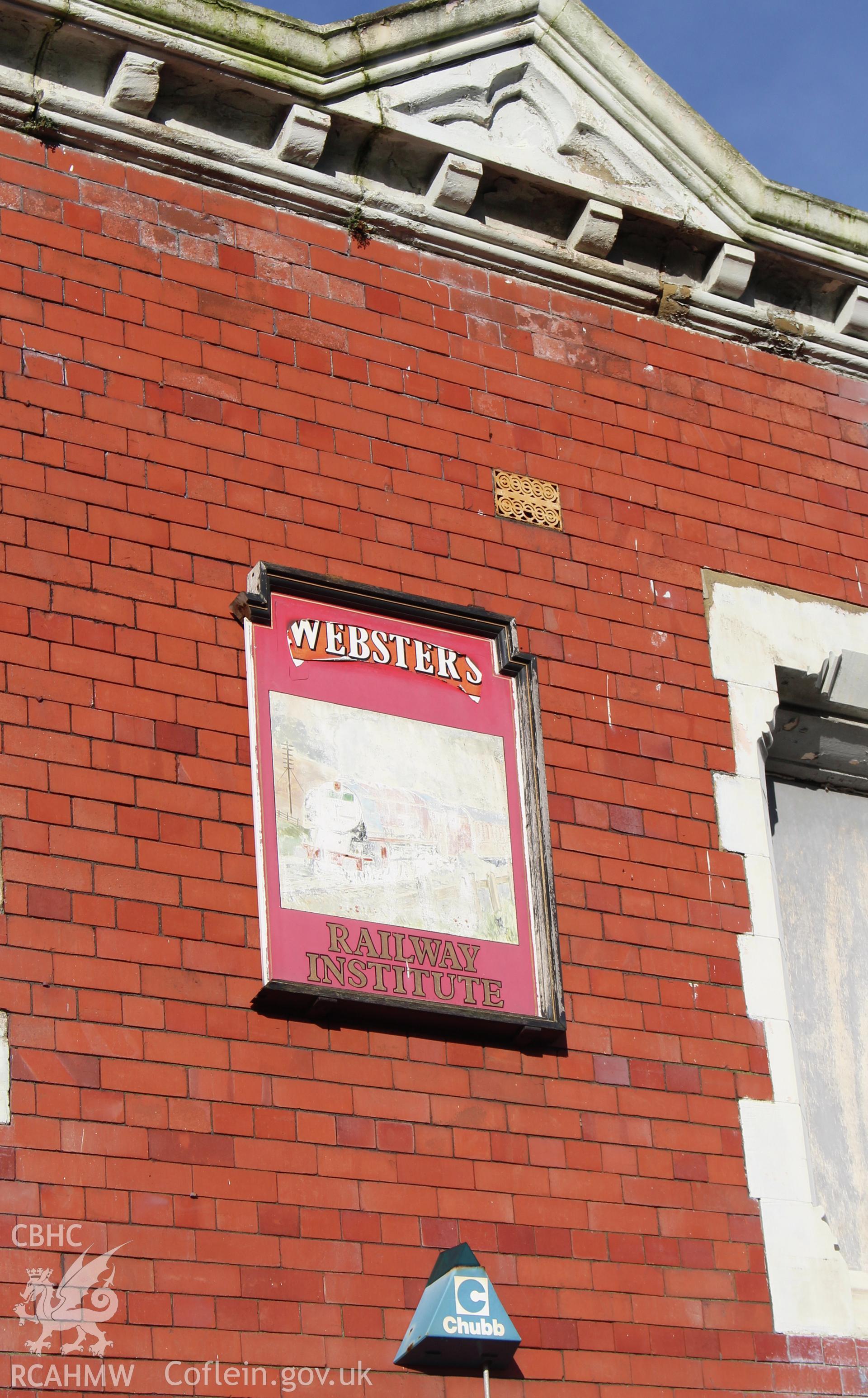 Detailed view of poster on side elevation wall at the Railway Institute, Bangor. Photographed during survey conducted by Sue Fielding for the RCAHMW on 4th April 2016.