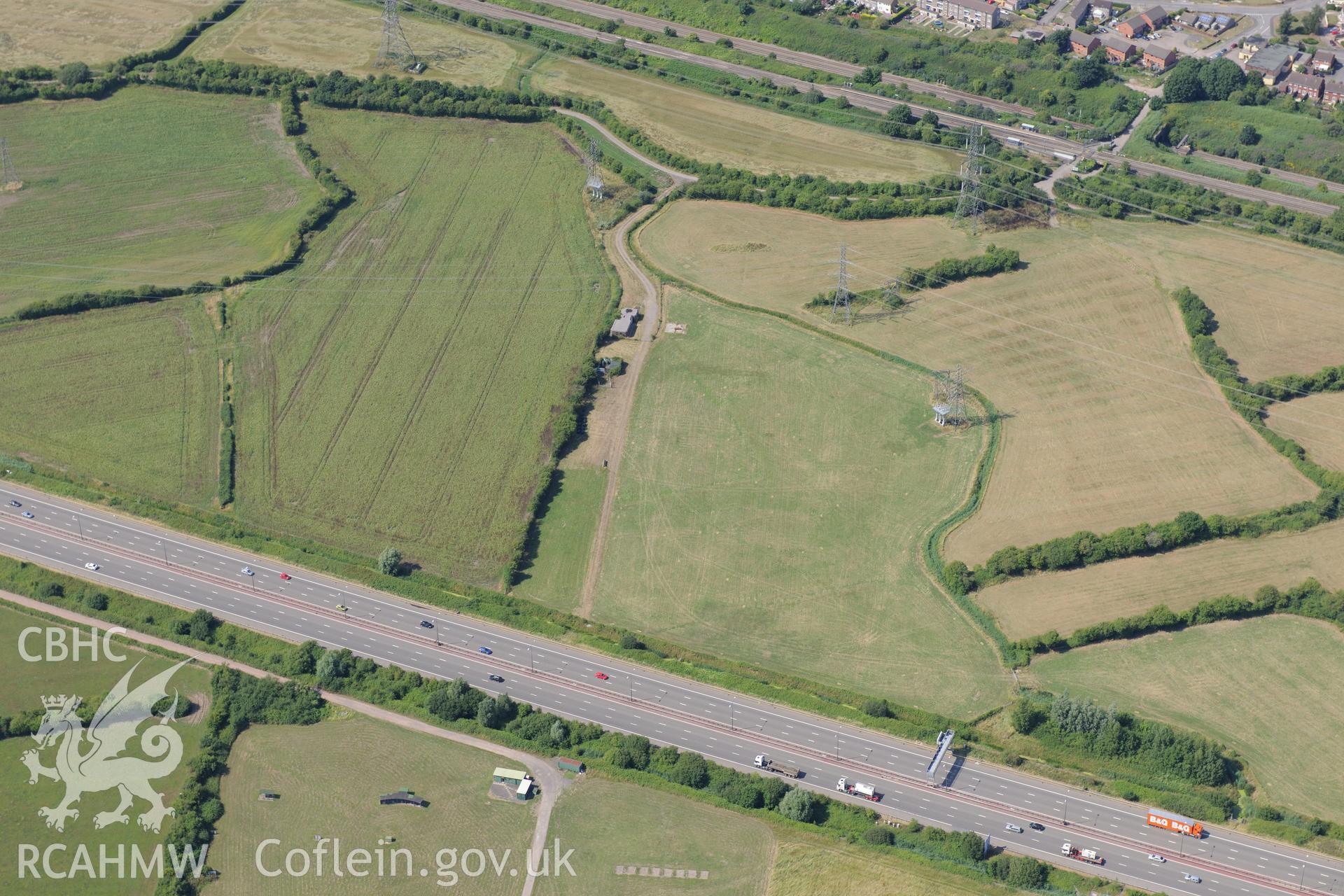 Caldicot & Rogiet rifle ranges, & section of M4 motorway running past southern edge of Caldicot on its way to 2nd Severn Crossing. Oblique aerial photograph taken during RCAHMW?s programme of archaeological aerial reconnaissance by Toby Driver, 01/08/2013.