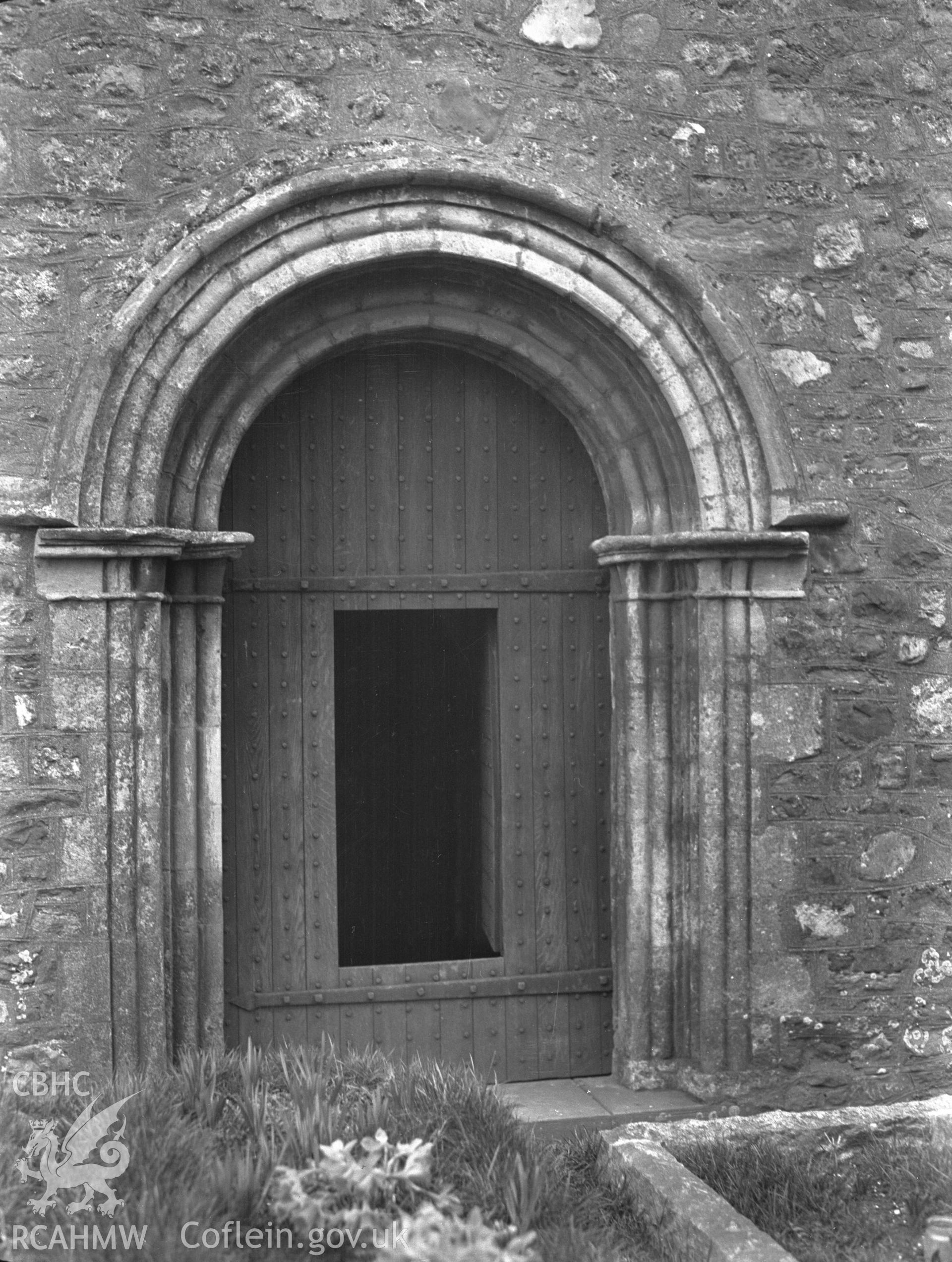 Digital copy of a nitrate negative showing exterior view of west doorway, St Augustine's Church, Rumney, taken circa 1936. From the National Building Record Postcard Collection.
