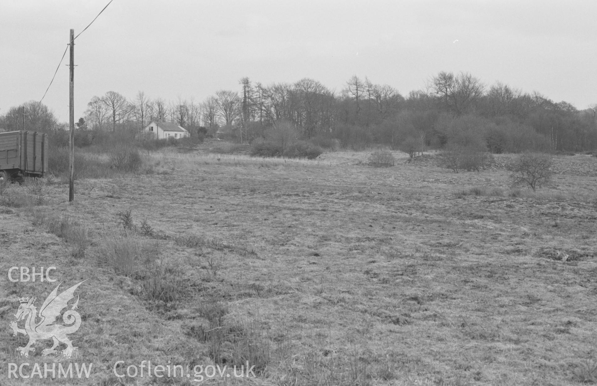 Digital copy of a black and white negative showing panorama of Llangybi Common; Nant-glas-fach on left, Nant Meurig in bushes in centre. Photographed by Arthur O. Chater in April 1968. [1 of 3]