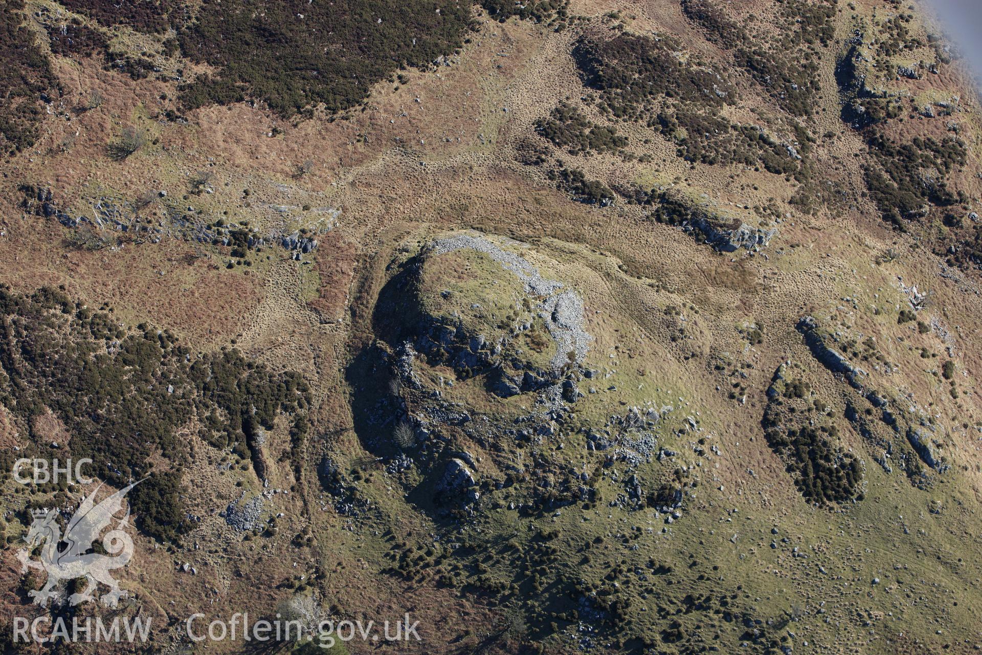 RCAHMW colour oblique photograph of Moel Offrwm lower camp. Taken by Toby Driver on 08/03/2010.