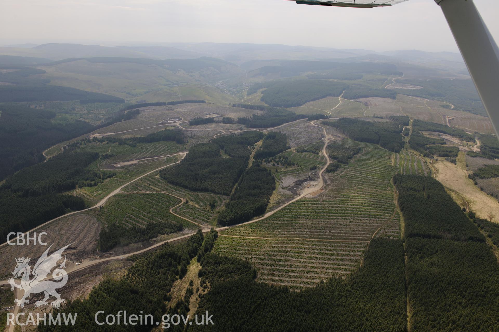 Pen y Cymoedd wind farm under construction before officially opening in September 2017.  Oblique aerial photograph taken during the Royal Commission's programme of archaeological aerial reconnaissance by Toby Driver on 11th June 2015.