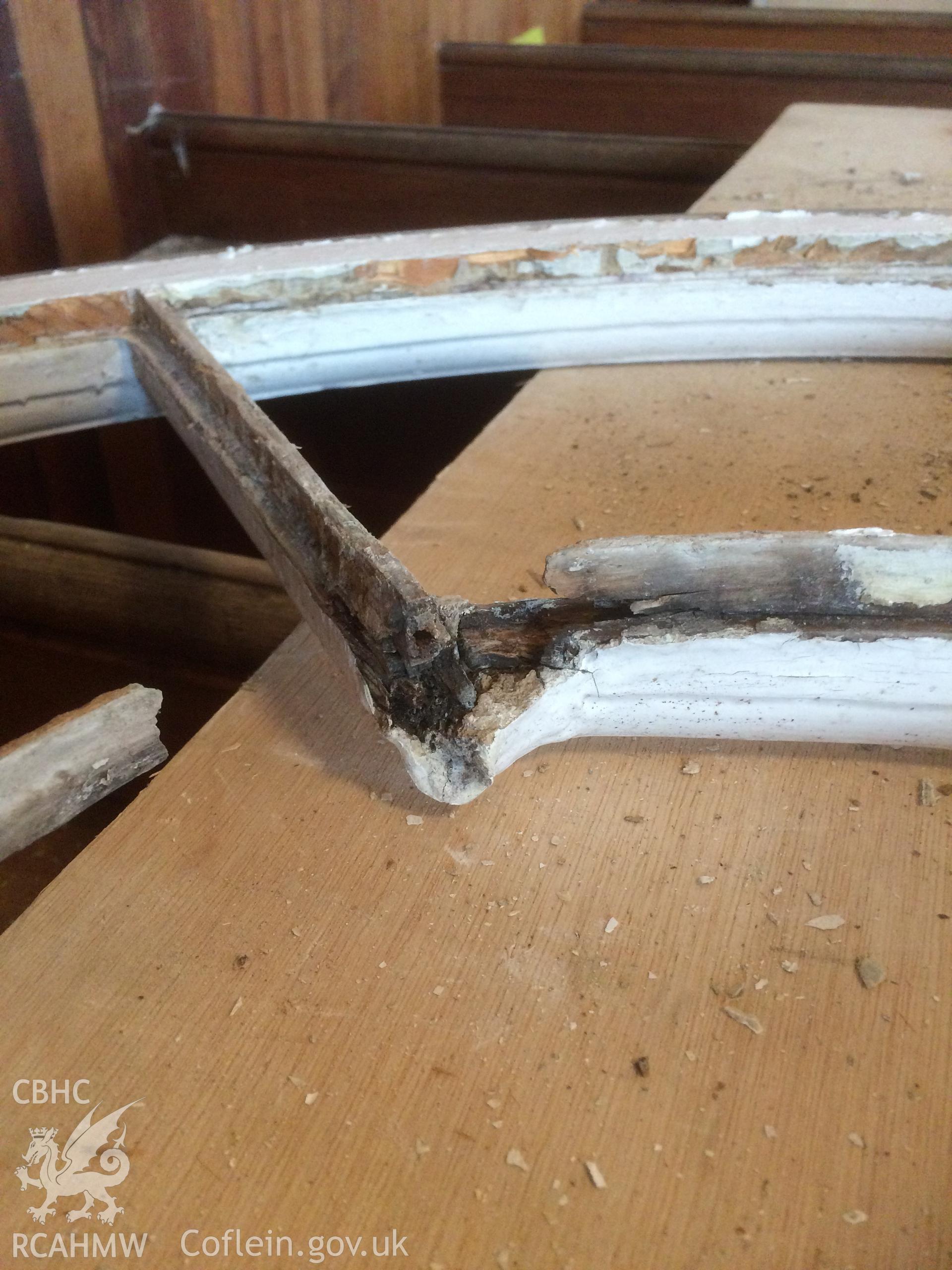 Photograph showing detailed view of a damaged wooden frame at the former Llawrybettws Welsh Calvinistic Methodist chapel, Glanyrafon, Corwen. Produced by Tim Allen on 18th January 2019 to meet a condition attached to planning application.