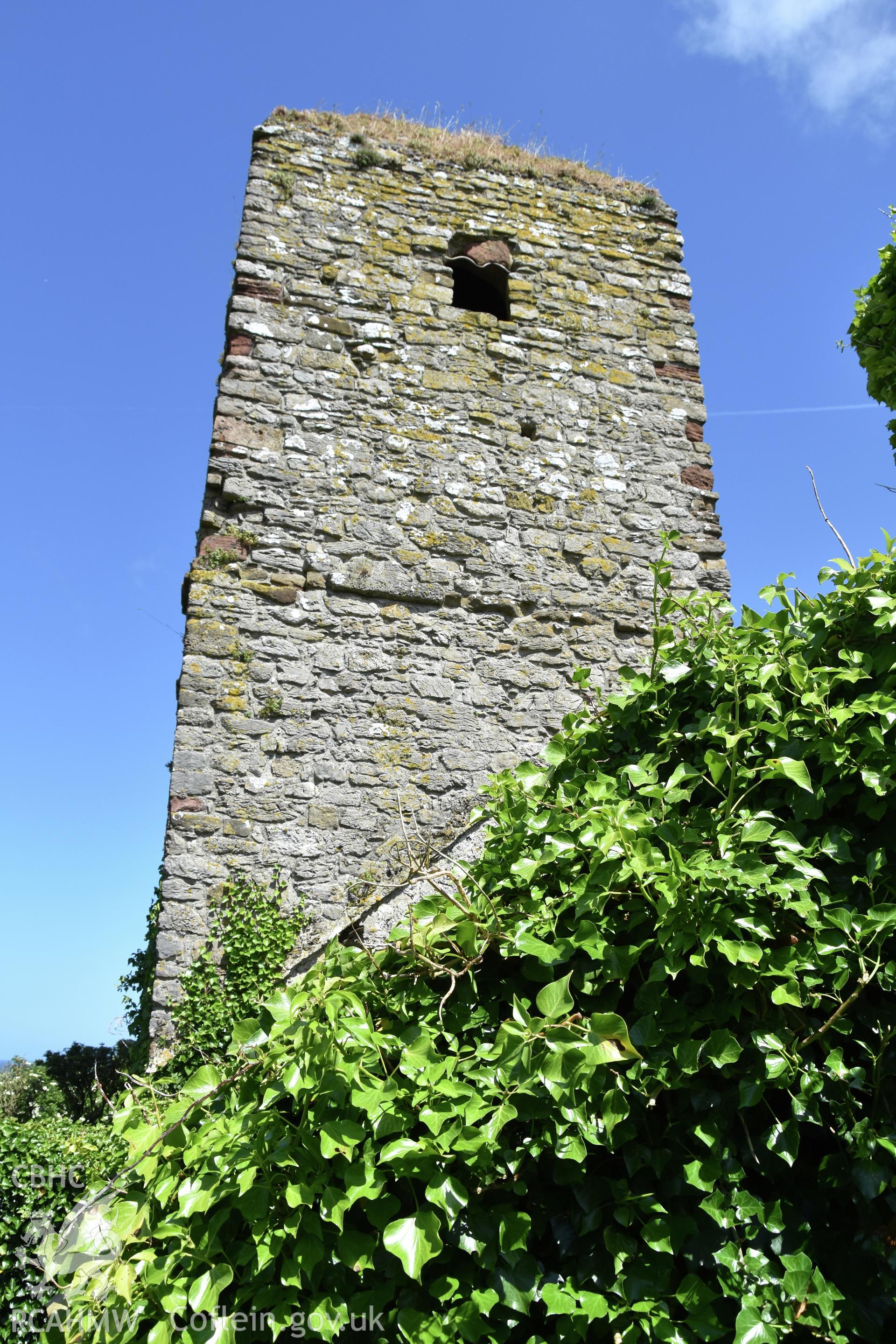 Investigator's photographic survey of the church on Puffin Island or Ynys Seiriol for the CHERISH Project. View showing the post medieval cottage on the south side of the tower, occupying the former transept of the church. ? Crown: CHERISH PROJECT 2018. Produced with EU funds through the Ireland Wales Co-operation Programme 2014-2020. All material made freely available through the Open Government Licence.
