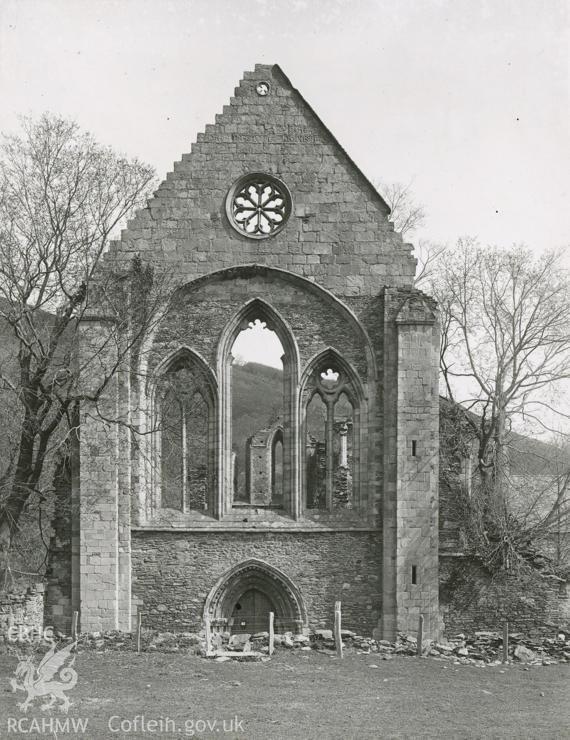 Digitised copy of a black and white print showing west front of church at Valle Crucis Abbey taken by F.H. Crossley, 1947. Negative held by NMR England.