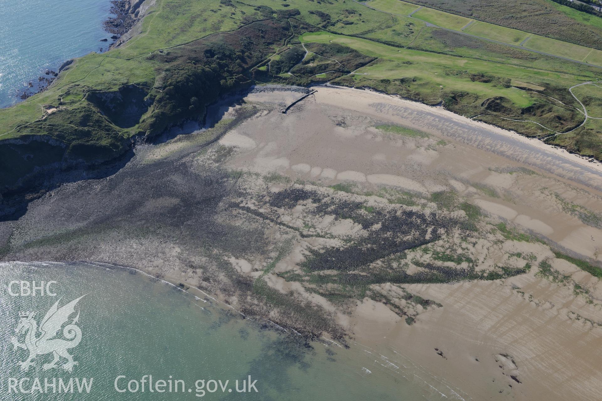 Penally rifle range and a loopholed wall on Penally's South Beach, south west of Tenby. Oblique aerial photograph taken during the Royal Commission's programme of archaeological aerial reconnaissance by Toby Driver on 30th September 2015.