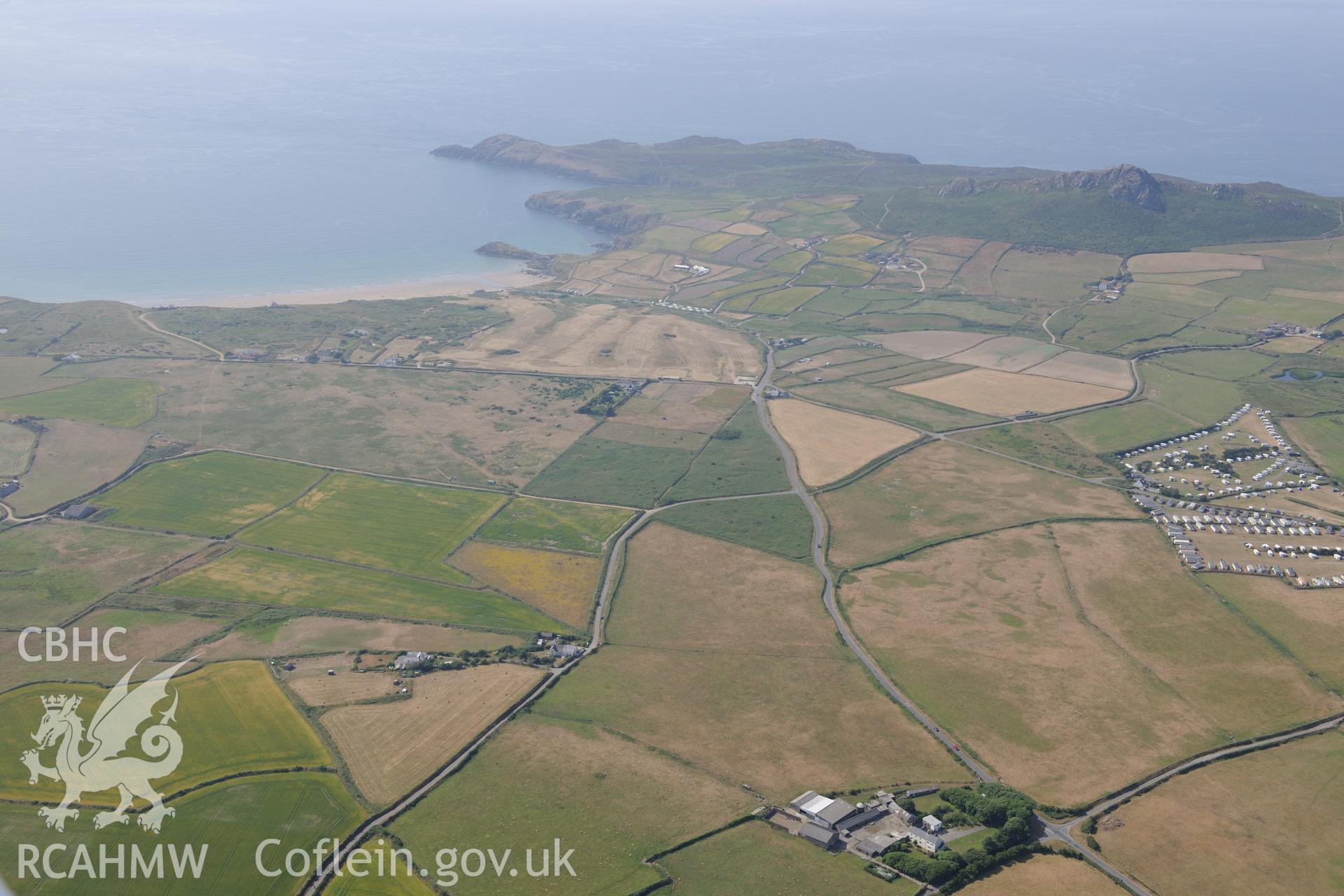 Parchmarks of possible township at Croes Phillip, and St Davids city golf course, Whitesands Bay. Oblique aerial photograph taken during the Royal Commission?s programme of archaeological aerial reconnaissance by Toby Driver on 16th July 2013.