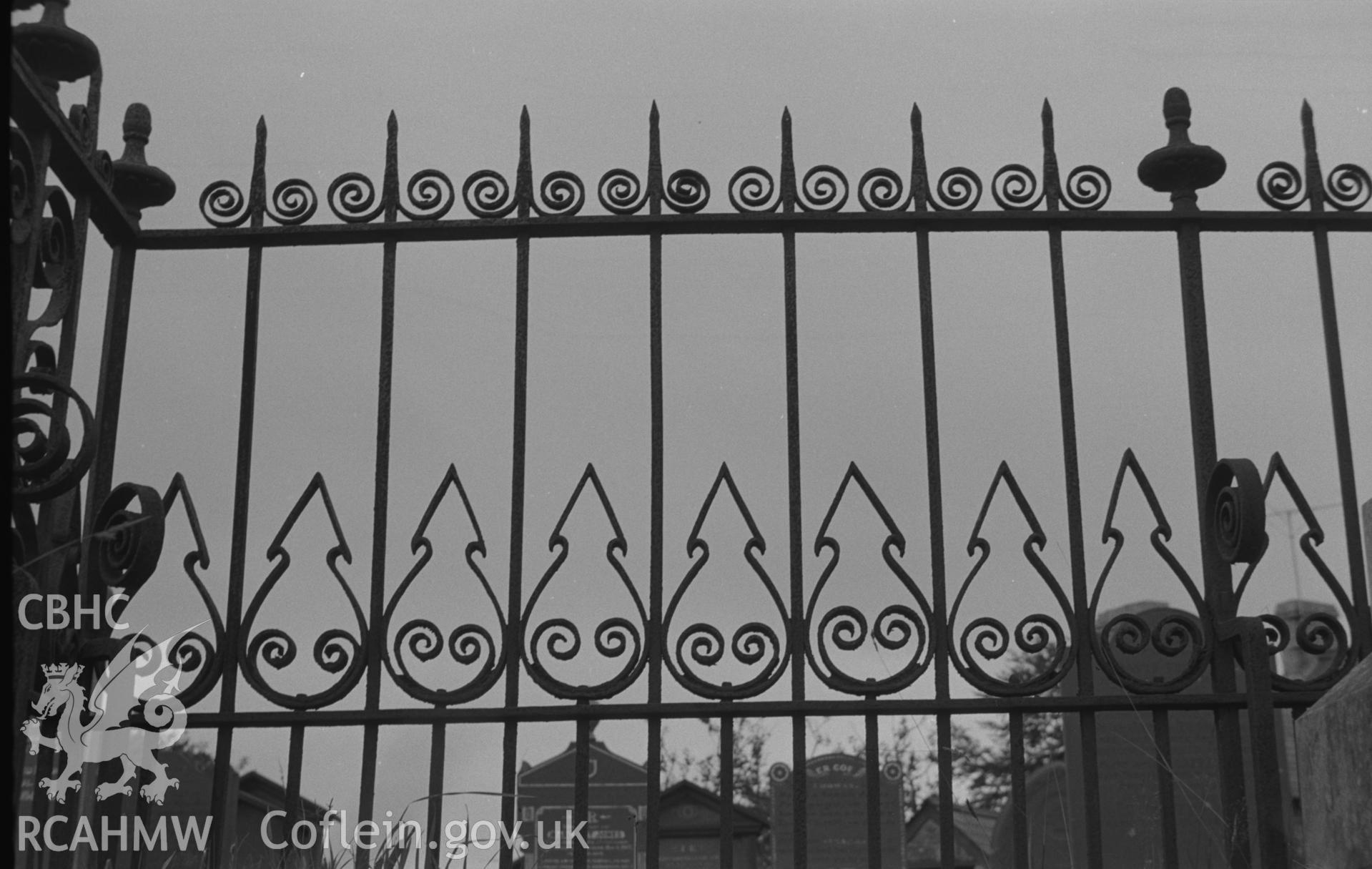 Digital copy of a black and white negative showing view of wrought iron gates at Capel Pant-y-Defaid Welsh Unitarian chapel, Pren-Gwyn, Llandysul. Photographed by Arthur O. Chater on 7th September 1966.