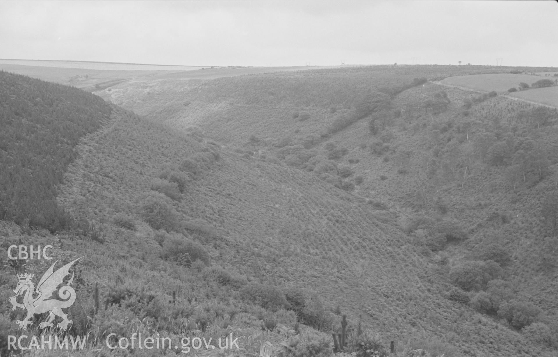 Digital copy of a black and white negative showing panoramic view of Carn Wen iron age camp, the Nant Cloigen and Pen-y-Graig farm, 2.3km east of Ffostrasol. Photographed by Arthur O. Chater in August 1967. (Looking north east - south from Grid Reference SN 394 471). [Photo 1 of 4]