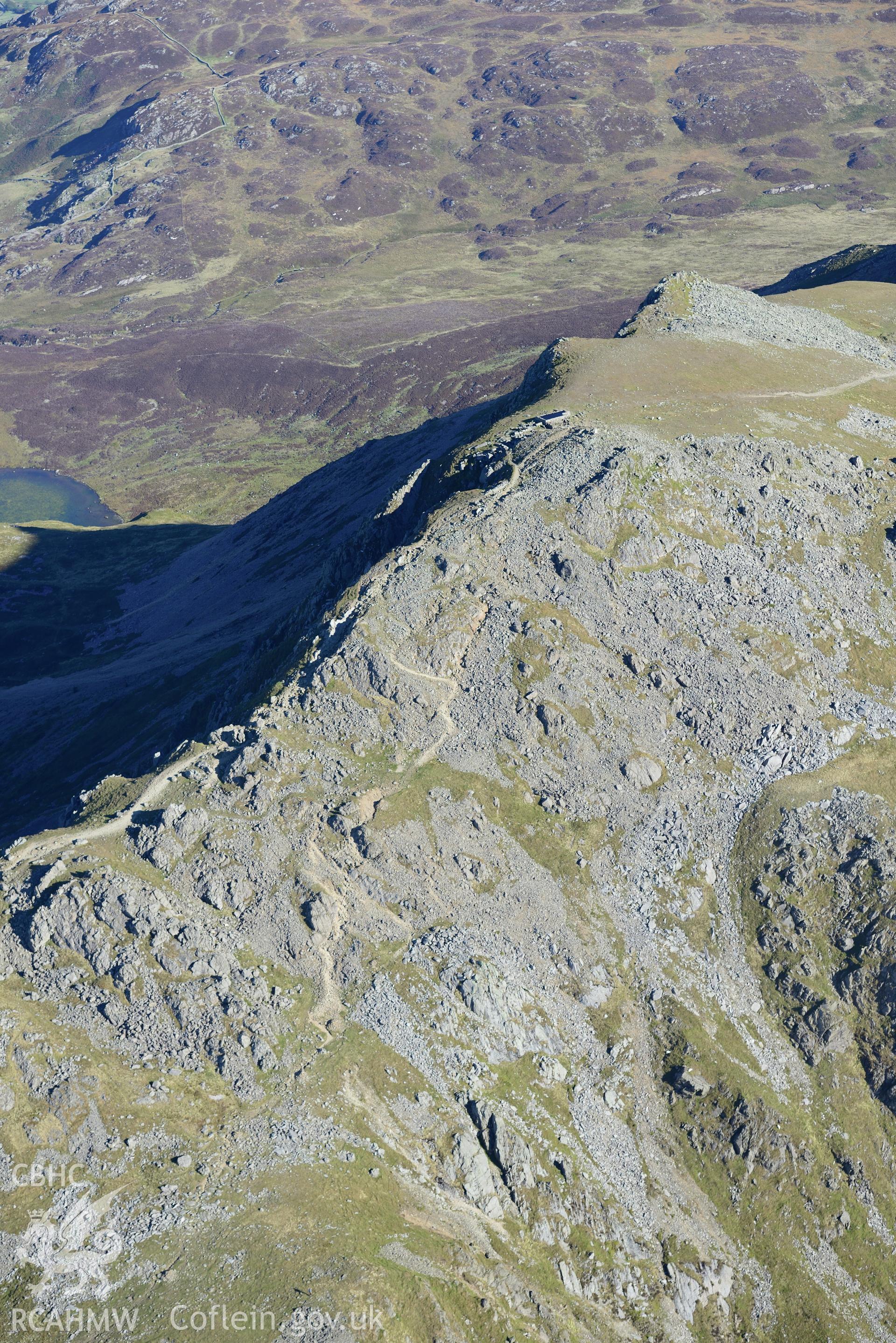 Penygadair - the summit of Cadair Idris. Oblique aerial photograph taken during the Royal Commission's programme of archaeological aerial reconnaissance by Toby Driver on 2nd October 2015.