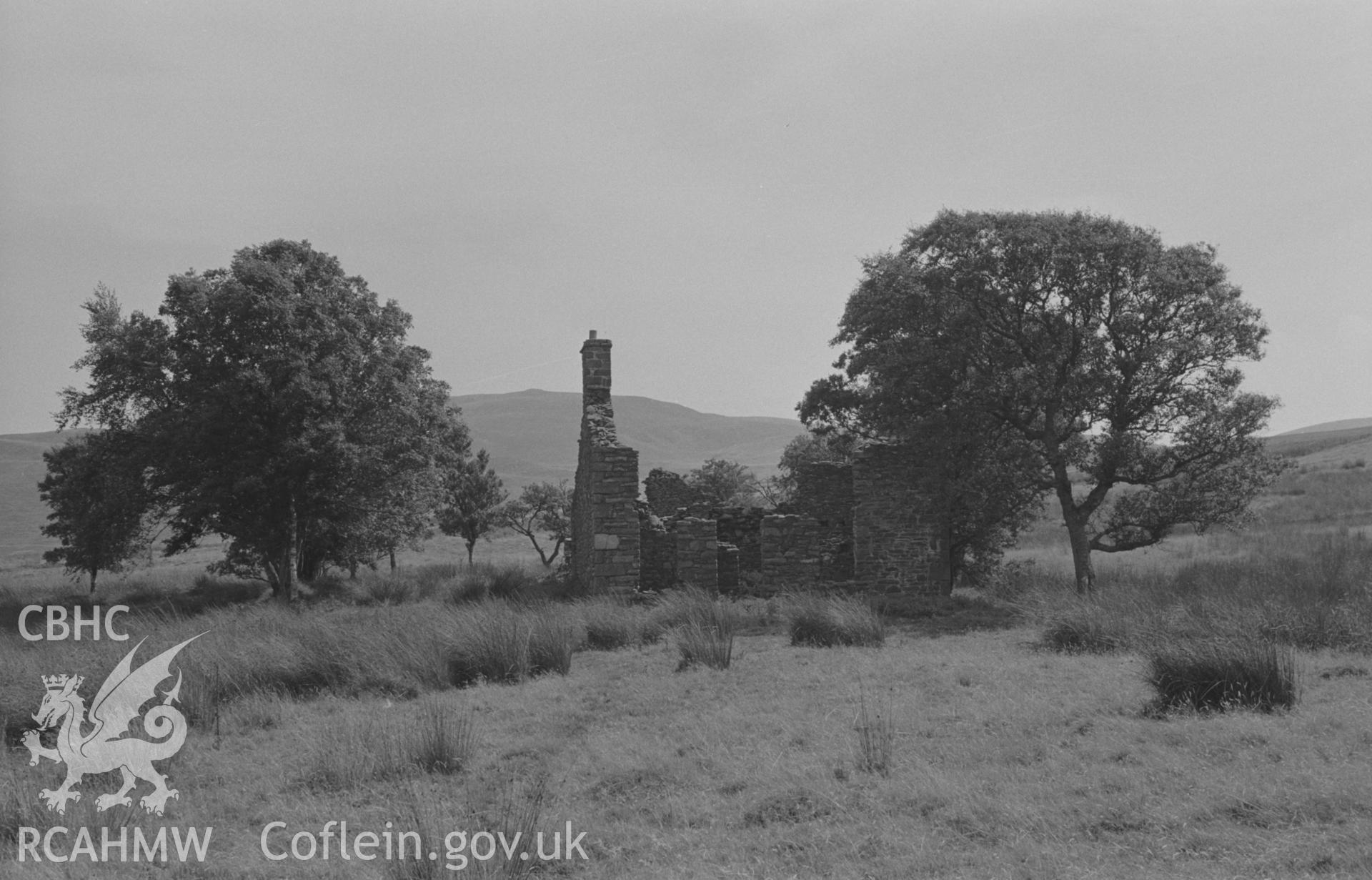 Digital copy of a black and white negative showing view of Pen-Cwm with Carn Fflur beyond. Photographed by Arthur O. Chater in August 1967. (Looking south east from Grid Reference SN 7344 6333).