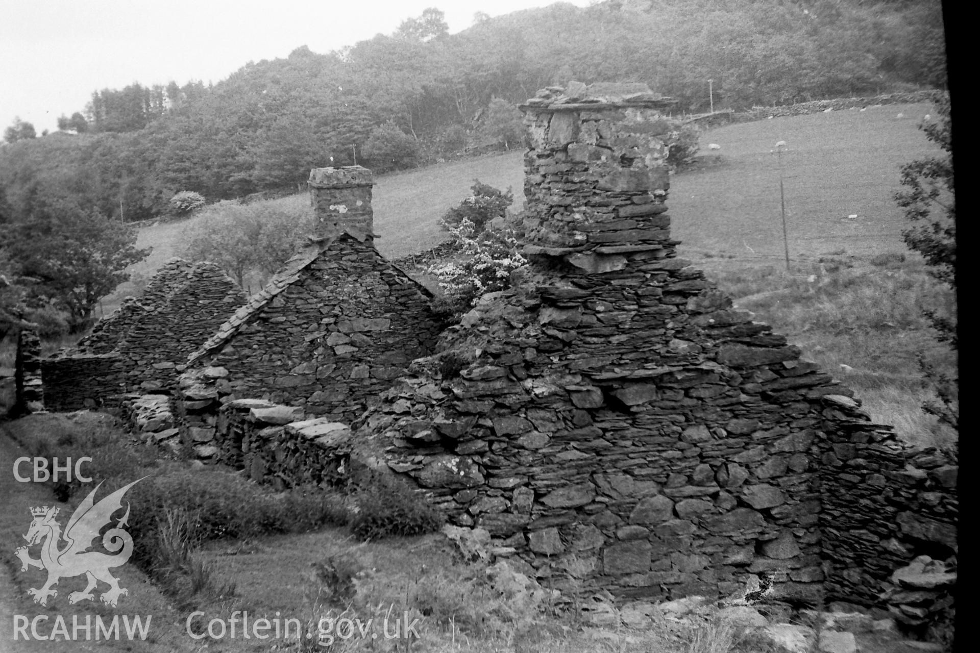 Digitised black and white photograph of abandoned Ty Isaf at Rhiwddolion. Produced during Bachelor of Architecture dissertation: 'The Form and Architecture of Nineteenth Century Industrial Settlements in Rural Wales' by Martin Davies, 1979.