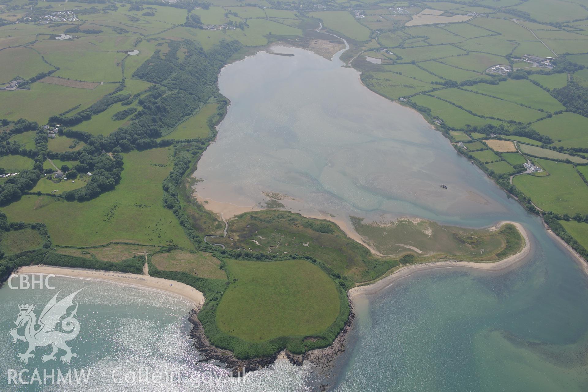 Anchorage at Traeth Dulas and a kelp kiln on Traeth yr Ora, south east of Amlwch, on the east coast of Anglesey. Oblique aerial photograph taken during the Royal Commission?s programme of archaeological aerial reconnaissance by Toby Driver on 12th July 2013.