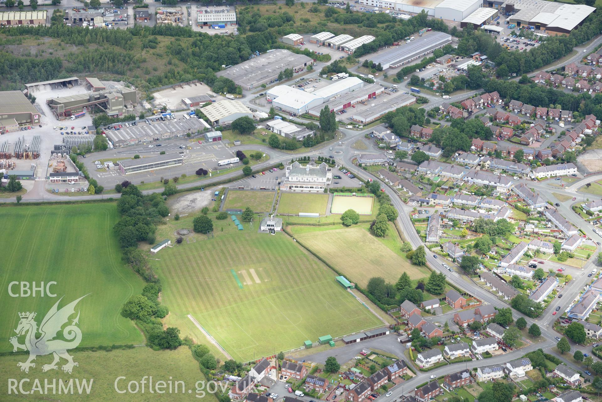 The village of Llay, near Wrexham, including view of Miner's Institute and Pavilion. Oblique aerial photograph taken during the Royal Commission's programme of archaeological aerial reconnaissance by Toby Driver on 30th July 2015.