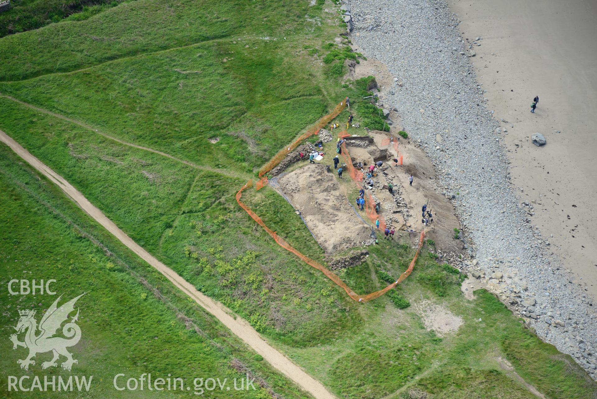 Dyfed Archaeological Trust excavating site of St. Patrick's chapel at Whitesands Bay. Oblique aerial photograph taken during the Royal Commission's programme of archaeological aerial reconnaissance by Toby Driver on 13th May 2015.
