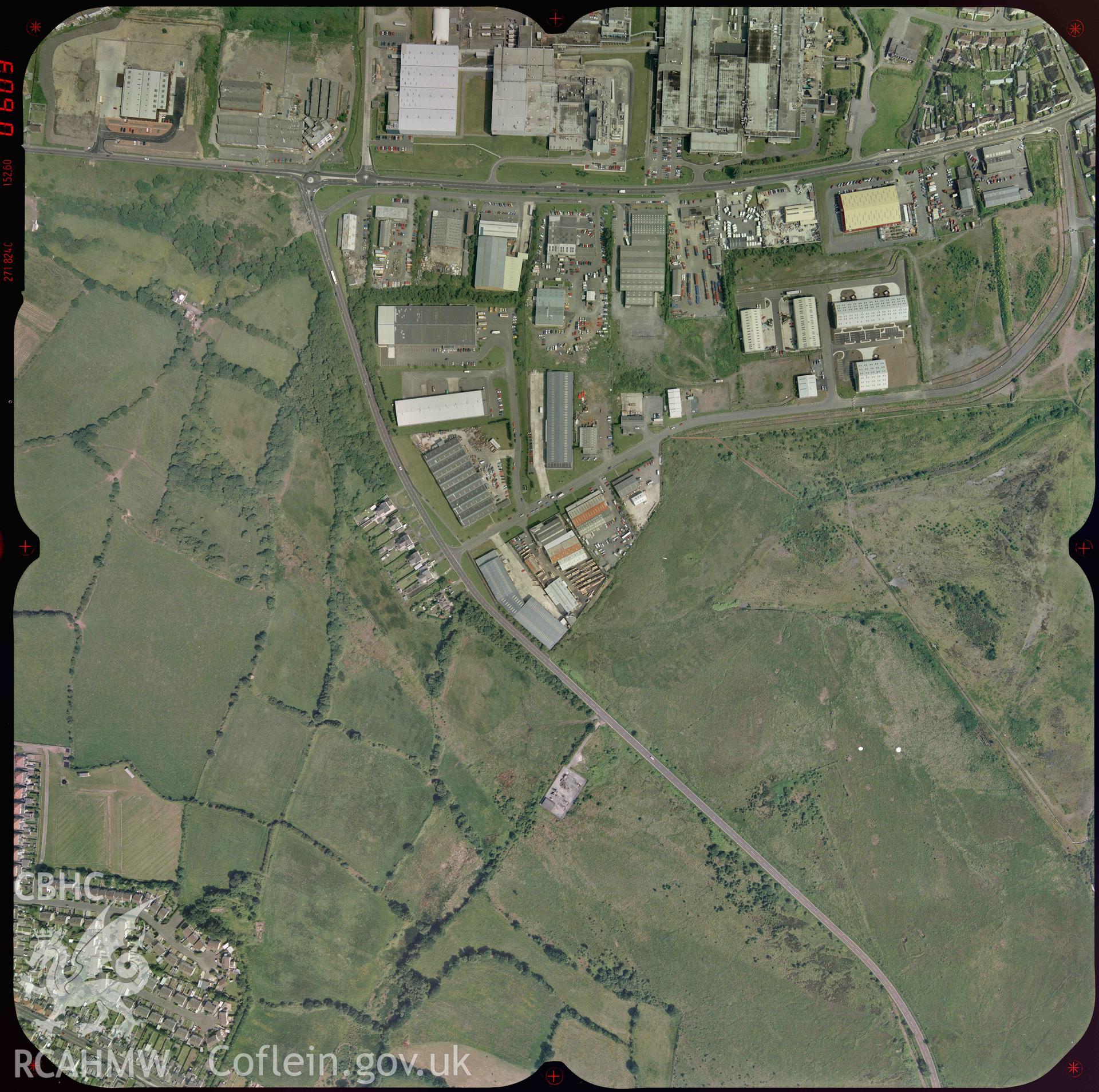 Digitised colour aerial photograph taken in May 1992. Part of material used in a Setting Impact Assessment of Land off Phoenix Way, Garngoch Business Village, Swansea, carried out by Archaeology Wales, 2018. Project number P2631.