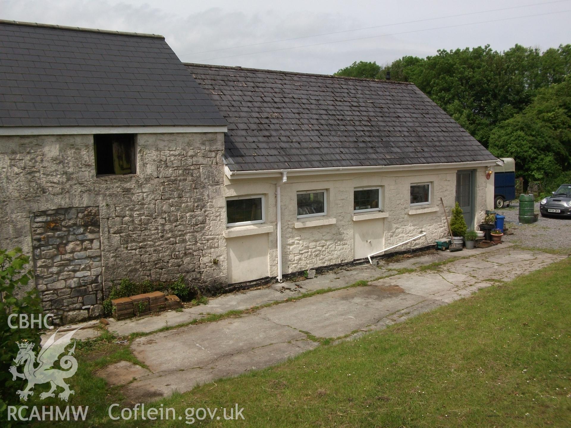Photograph showing exterior rear elevation of cottage and attached building at Pant-y-Castell, Maesybont, Photographed by Mark Waghorn to meet a condition attached to planning application.