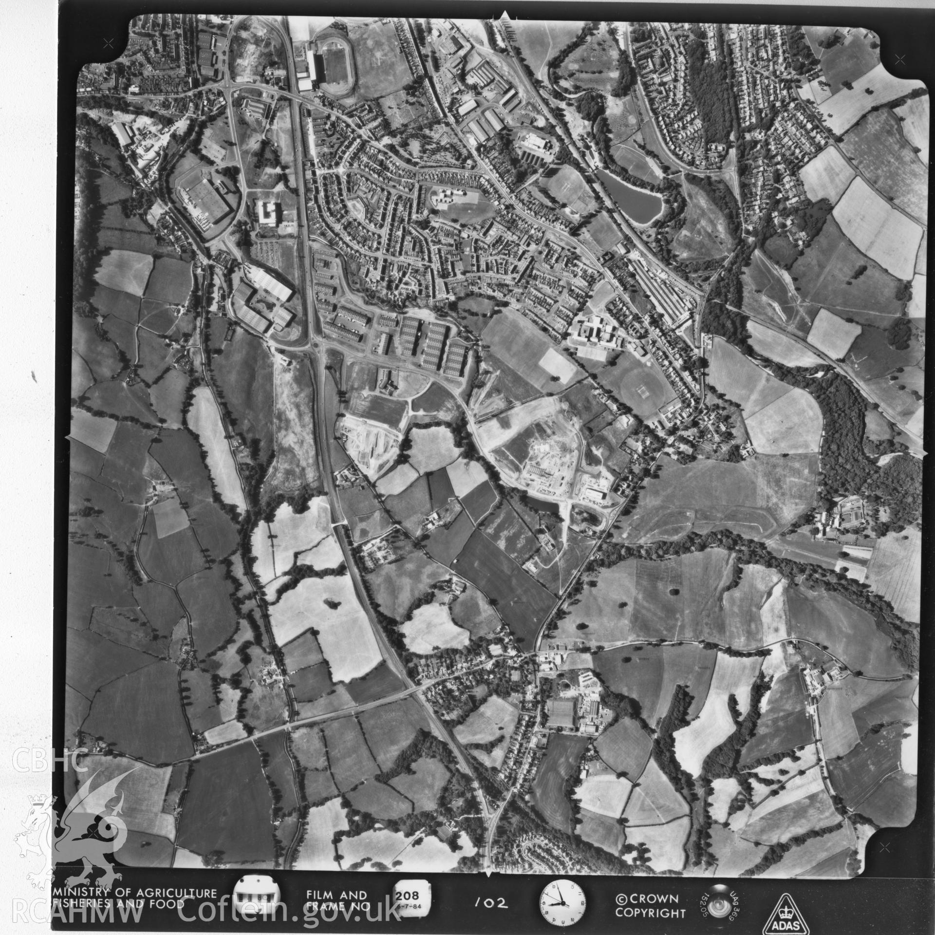 Aerial photograph of Cwmbran, taken in 1984. Included as part of Archaeology Wales' desk based assessment of former Llantarnam Community Primary School, Croeswen, Oakfield, Cwmbran, conducted in 2017.