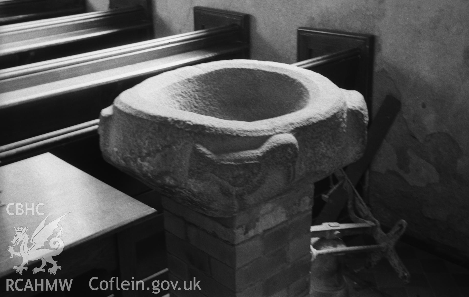 Digital copy of a black and white negative showing the font at St. Mary's Church, Llanfair Clydogau. Photographed in April 1963 by Arthur O. Chater from Grid Reference SN 624 512.