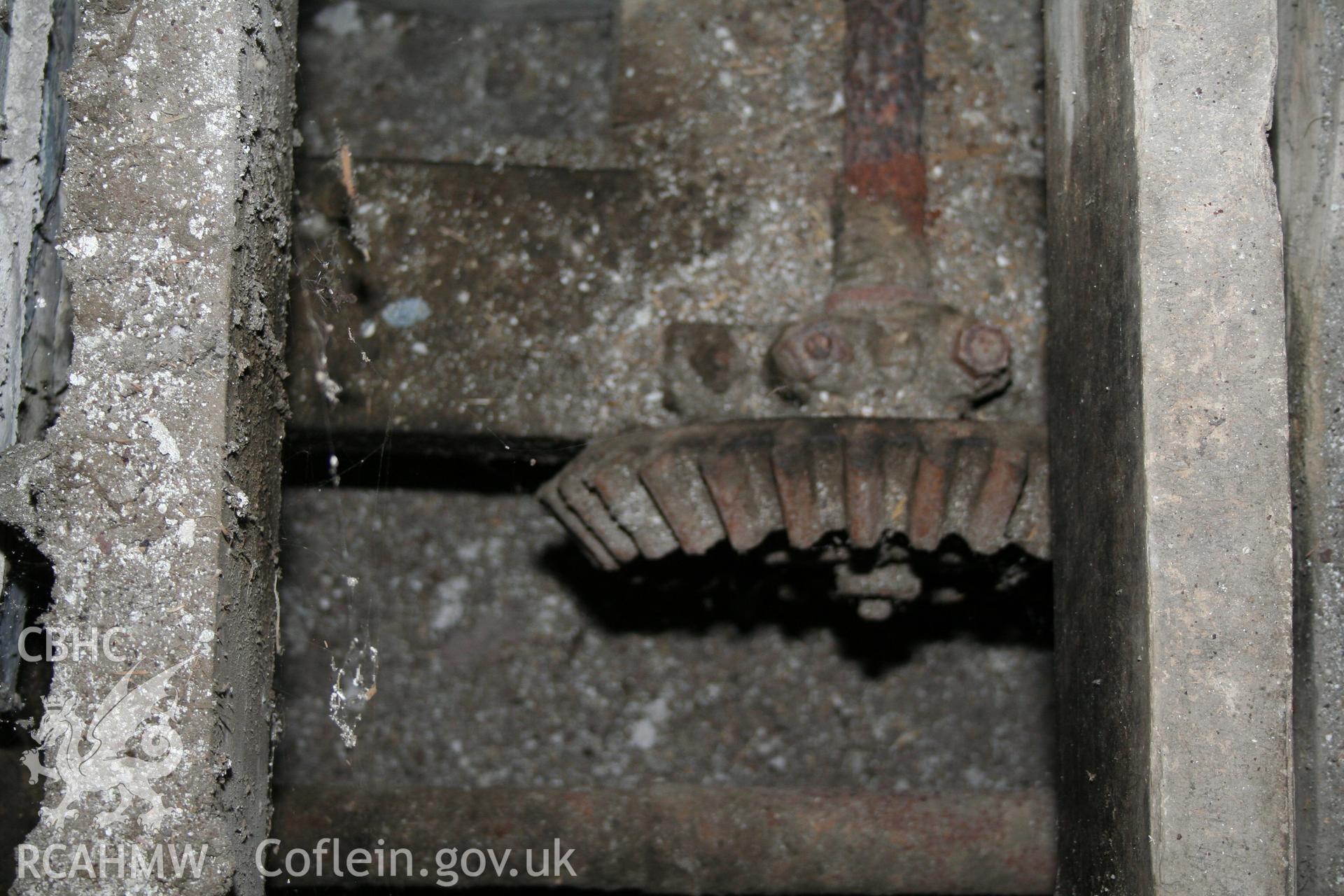 Interior view showing iron cog. Photographic survey of the threshing house, straw house, mixing house and root house at Tan-y-Graig Farm, Llanfarian, conducted by Geoff Ward and John Wiles, 11th December 2006.