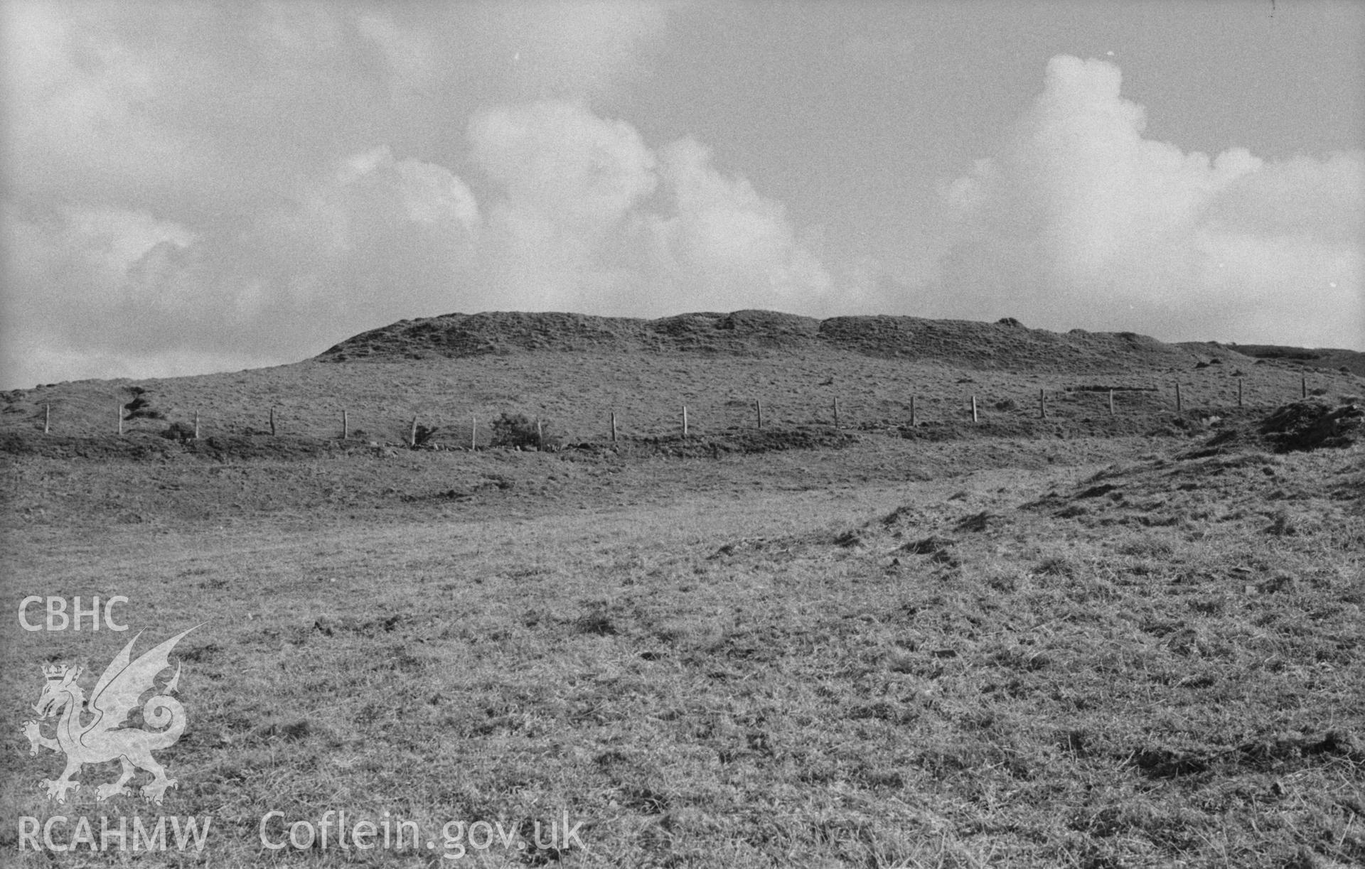 Digital copy of a black and white negative showing the north west corner of Pen Dinas, Elerch. Photographed in April 1963 by Arthur O. Chater from Grid Reference SN 676 878, looking south east.