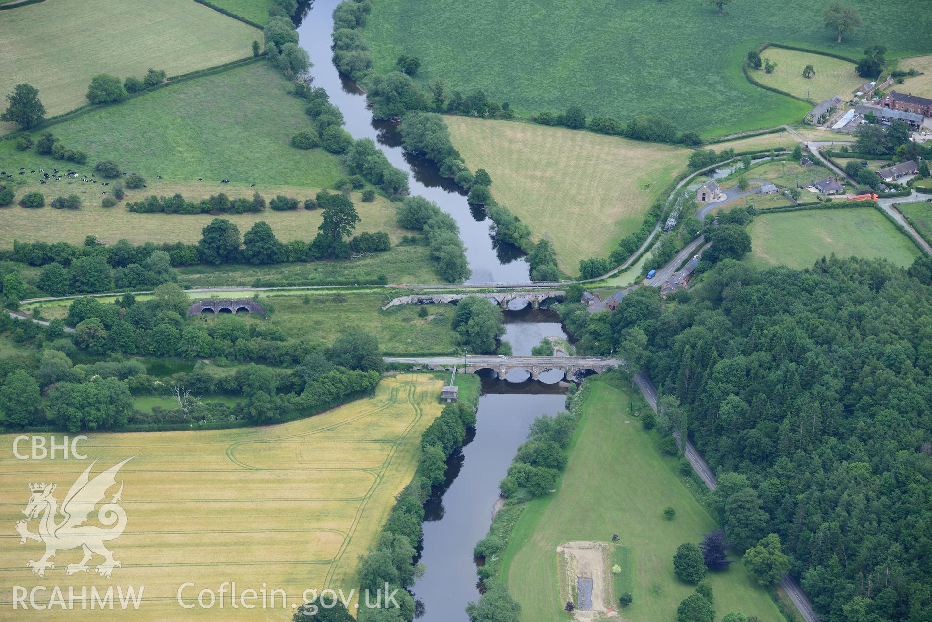 Vyrnwy aqueduct, Pentreheylin bridge and Vyrnwy south flood arches on the Montgomeryshire canal, south west of Oswestry. Oblique aerial photograph taken during the Royal Commission's programme of archaeological aerial reconnaissance by Toby Driver on 30th June 2015.