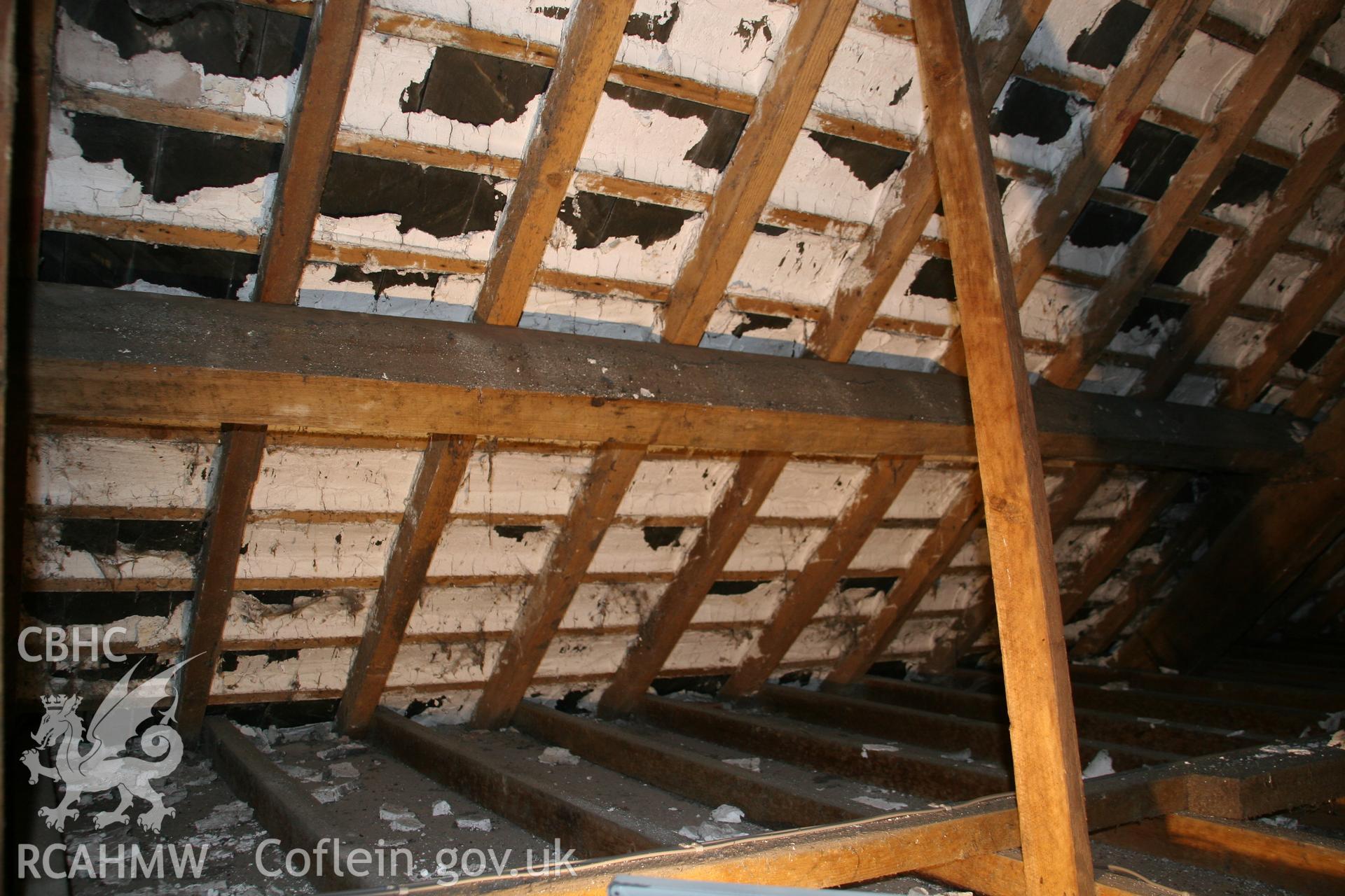 Photograph showing detailed interior view of wooden beams and roof of the former Llawrybettws Welsh Calvinistic Methodist chapel, Glanyrafon, Corwen. Produced by Tim Allen on 27th February 2019 to meet a condition attached to planning application.