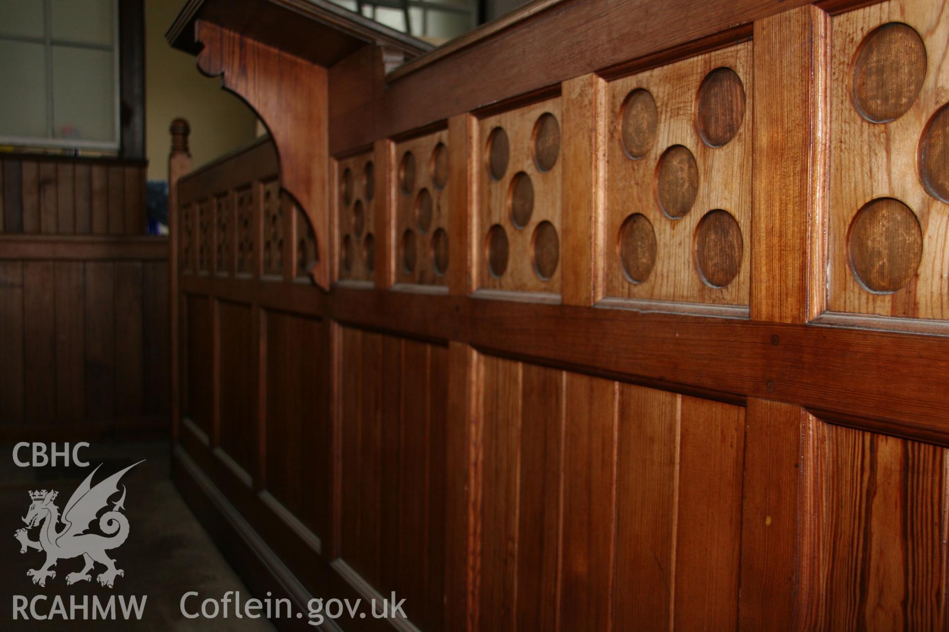 Photograph showing detailed view of wooden panelling at the former Llawrybettws Welsh Calvinistic Methodist chapel, Glanyrafon, Corwen. Produced by Tim Allen on 7th March 2019 to meet a condition attached to planning application.