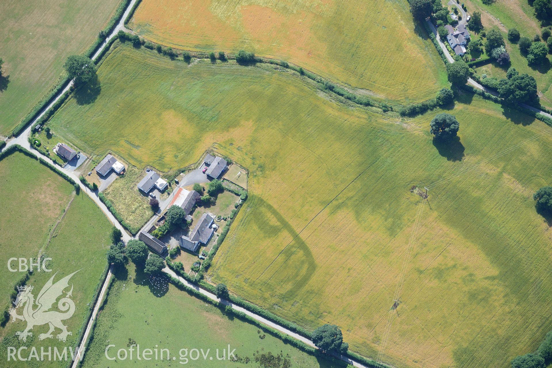 Royal Commission aerial photography of Plas Adda defended enclosure cropmarks taken on 19th July 2018 during the 2018 drought.