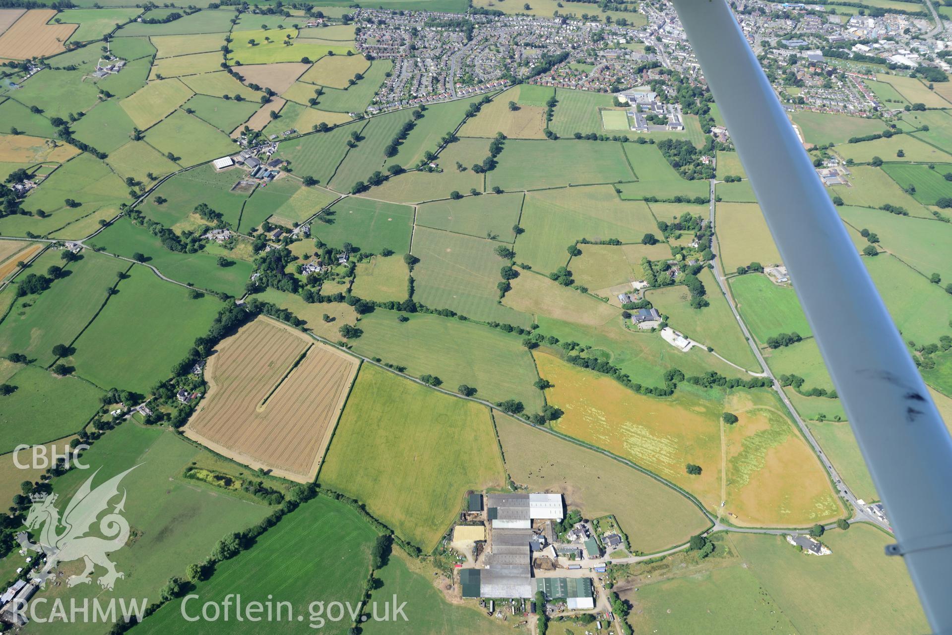 Royal Commission aerial photography of cropmarks of Plas yn Rhal barrow cemetery taken on 19th July 2018 during the 2018 drought.