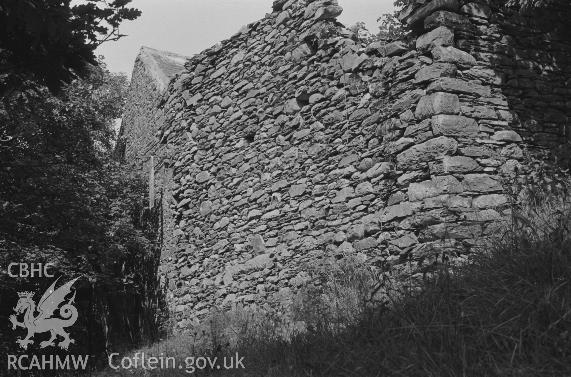 Digital copy of a black and white negative showing the wall of the ruined building of Felin Fflur between the wheelhouse and the most easterly building - showing sluice control pully. Photographed by Arthur O. Chater in August 1967. (Looking west north west from Grid Reference SN 7205 6428).