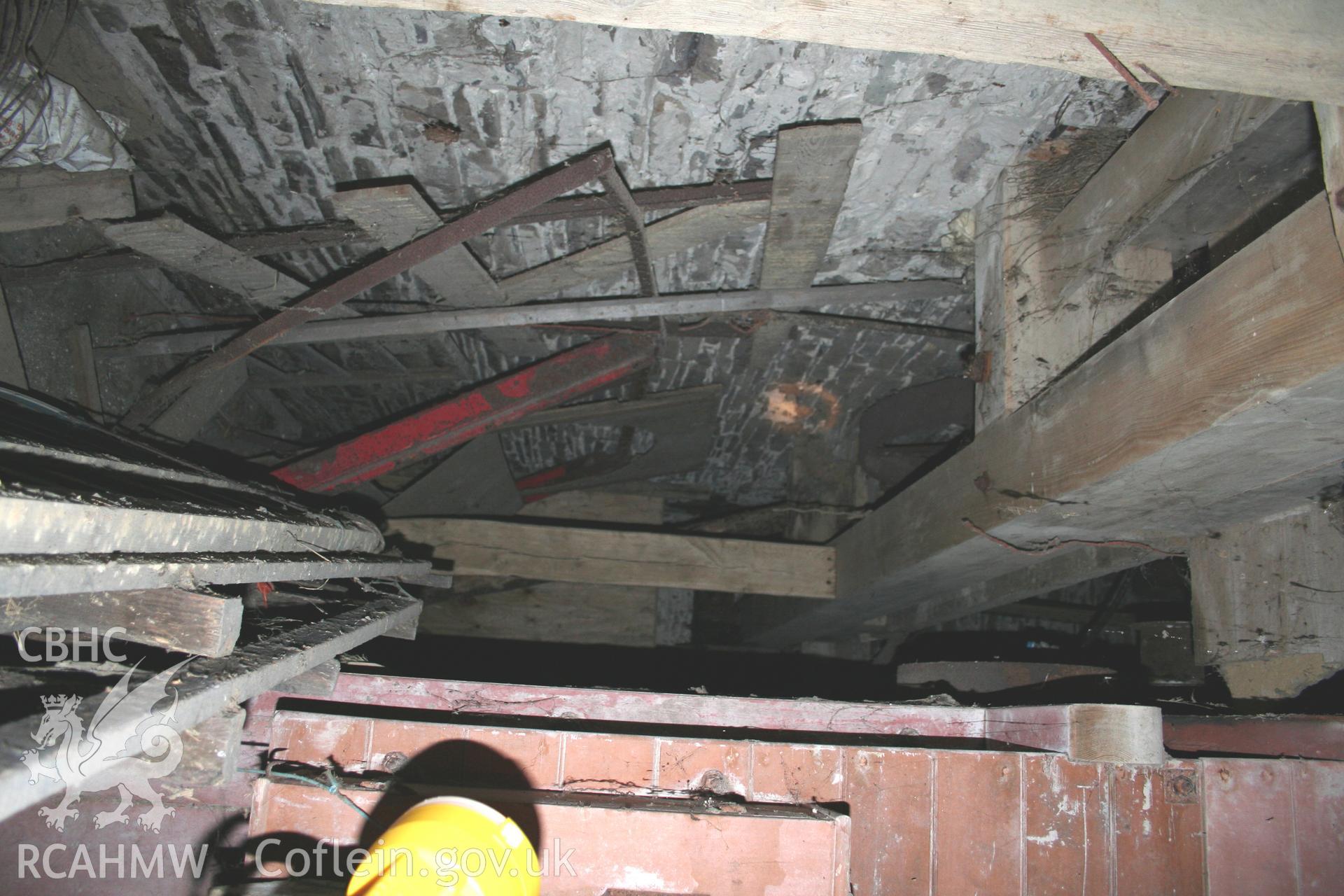 Interior view showing disused equipment. Photographic survey of the threshing house, straw house, mixing house and root house at Tan-y-Graig Farm, Llanfarian, conducted by Geoff Ward and John Wiles, 11th December 2006.