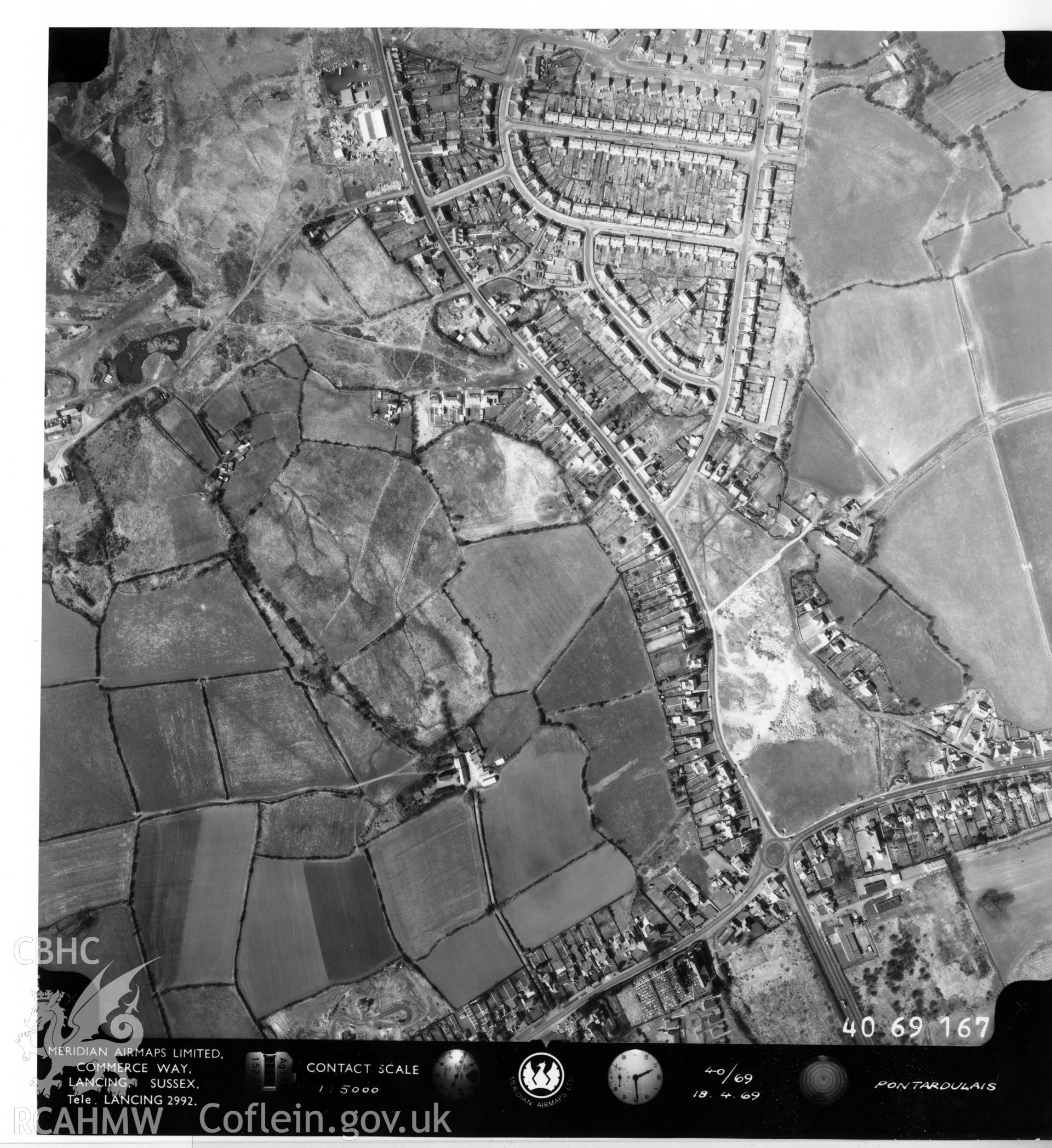 Black and white aerial photograph taken in April 1969. Part of material used in a Setting Impact Assessment of Land off Phoenix Way, Garngoch Business Village, Swansea, carried out by Archaeology Wales, 2018. Project number P2631.