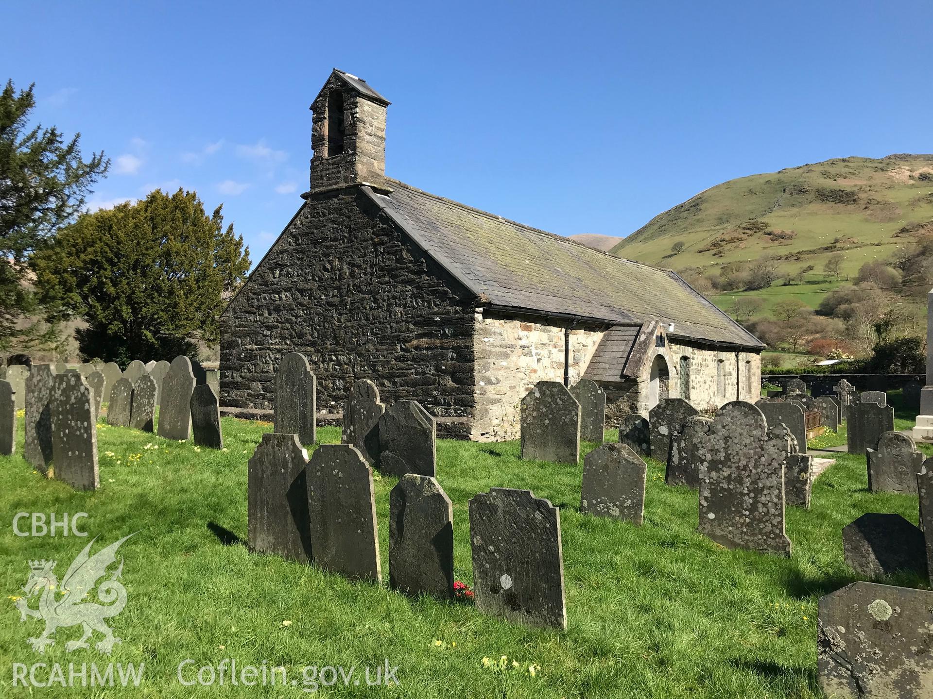 Colour photograph showing exterior view of Eglwys Mihangel (St. Michael's Church) and graveyard, Llanfihangel-y-Pennant, taken by Paul R. Davis on 28th March 2019.