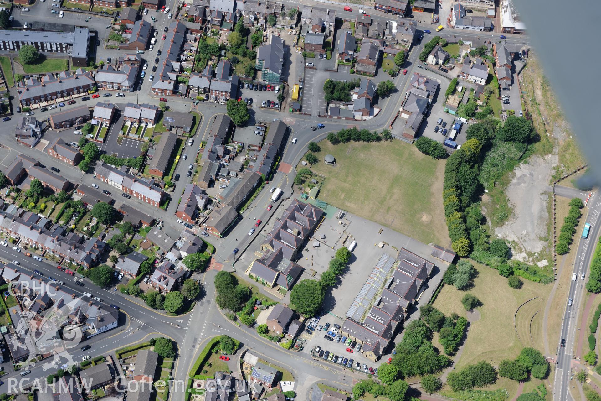 View centred around Madeira Hill cottage, Wrexham. Oblique aerial photograph taken during the Royal Commission's programme of archaeological aerial reconnaissance by Toby Driver on 30th June 2015.