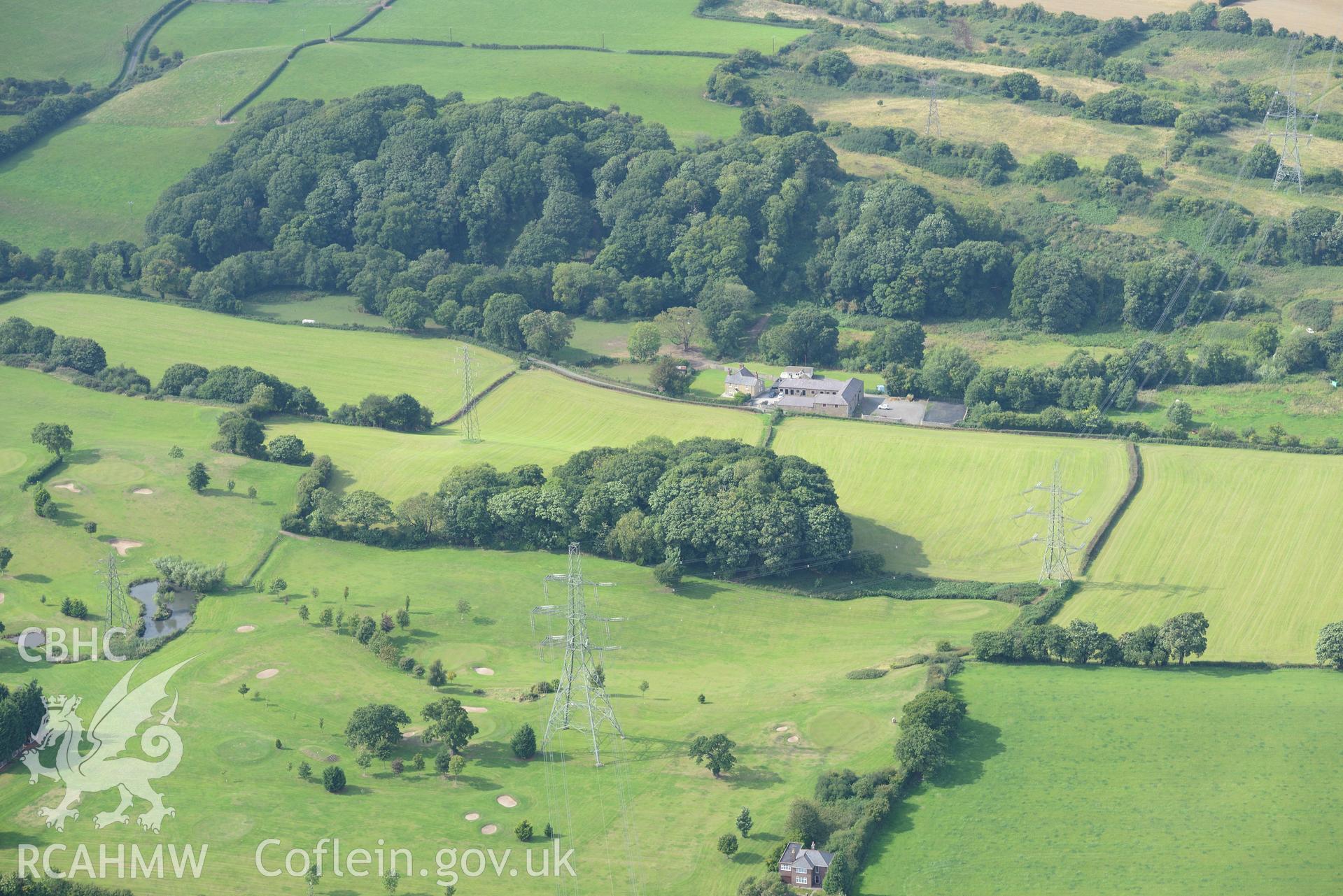 Bryn-y-Cwm motte, near Flint. Oblique aerial photograph taken during the Royal Commission's programme of archaeological aerial reconnaissance by Toby Driver on 11th September 2015.
