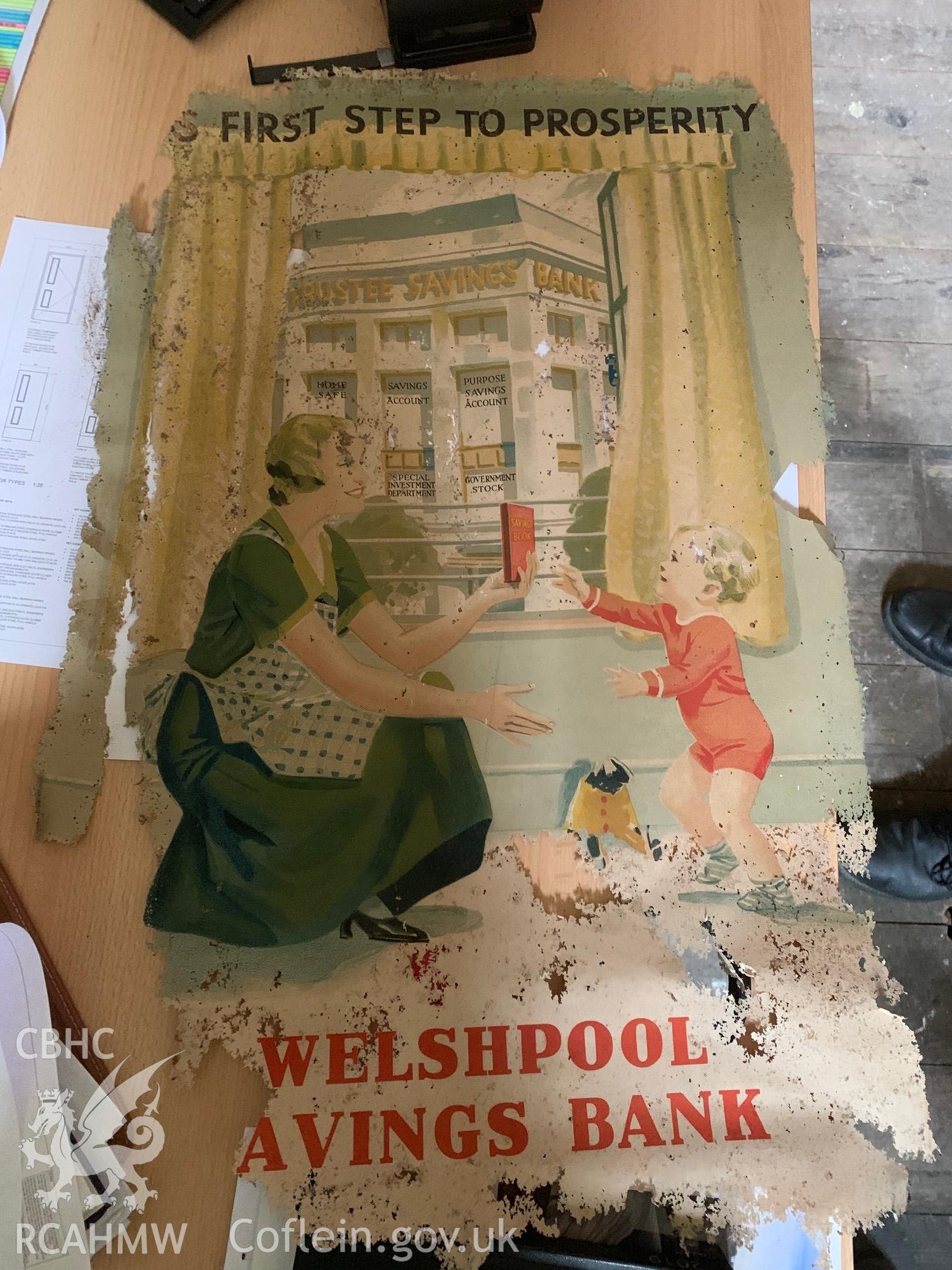 Digital colour photograph showing poster for Welshpool Savings Bank. Photographed as part of CPAT Project 2351: 2 Severn Street, Welshpool, Powys - Archaeological Watching Brief, 2019. Report no. 1663.