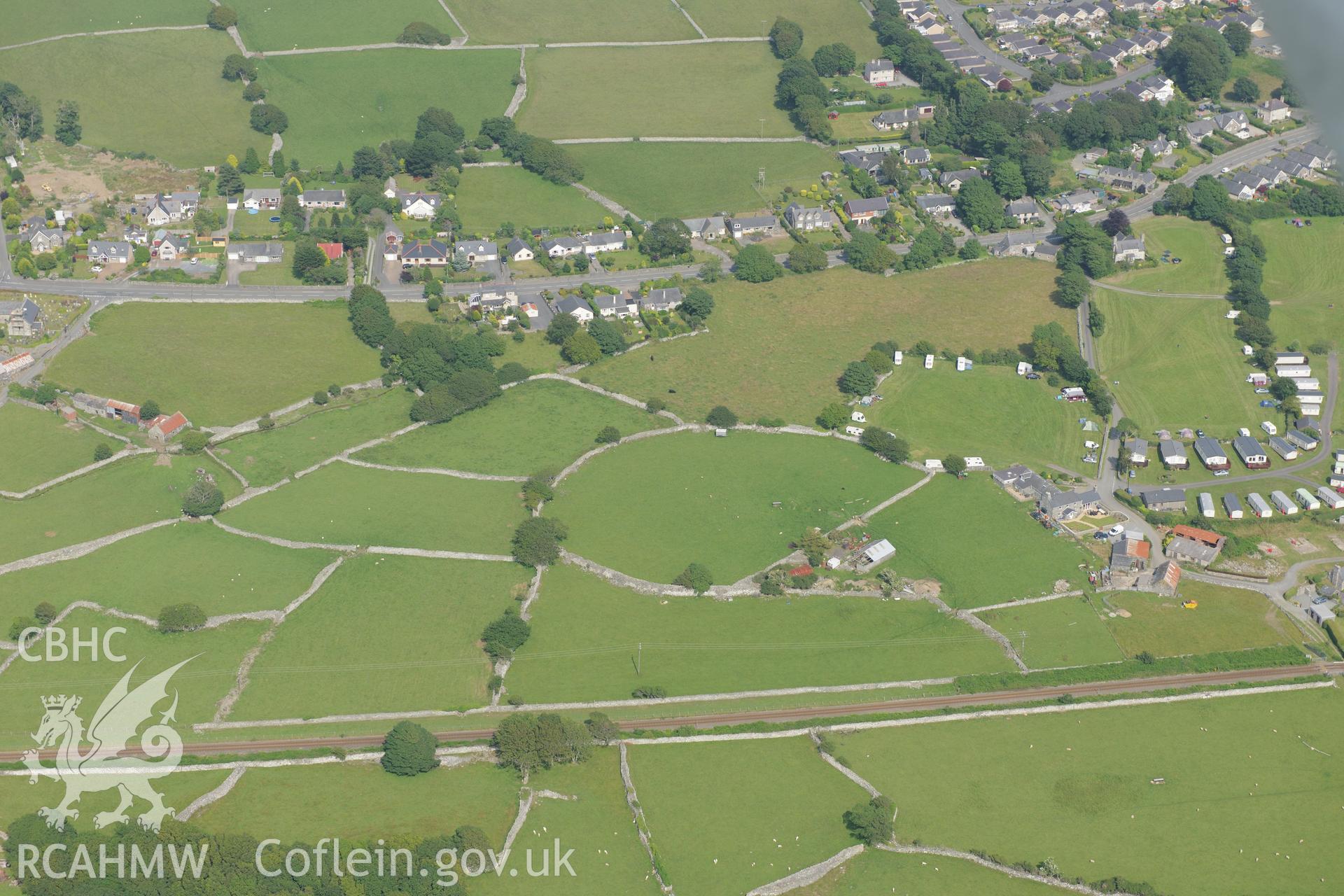 Ty'n-y-Cae field system, west of Tal-y-Bont, Dyffryn Ardudwy. Oblique aerial photograph taken during the Royal Commission?s programme of archaeological aerial reconnaissance by Toby Driver on 12th July 2013.