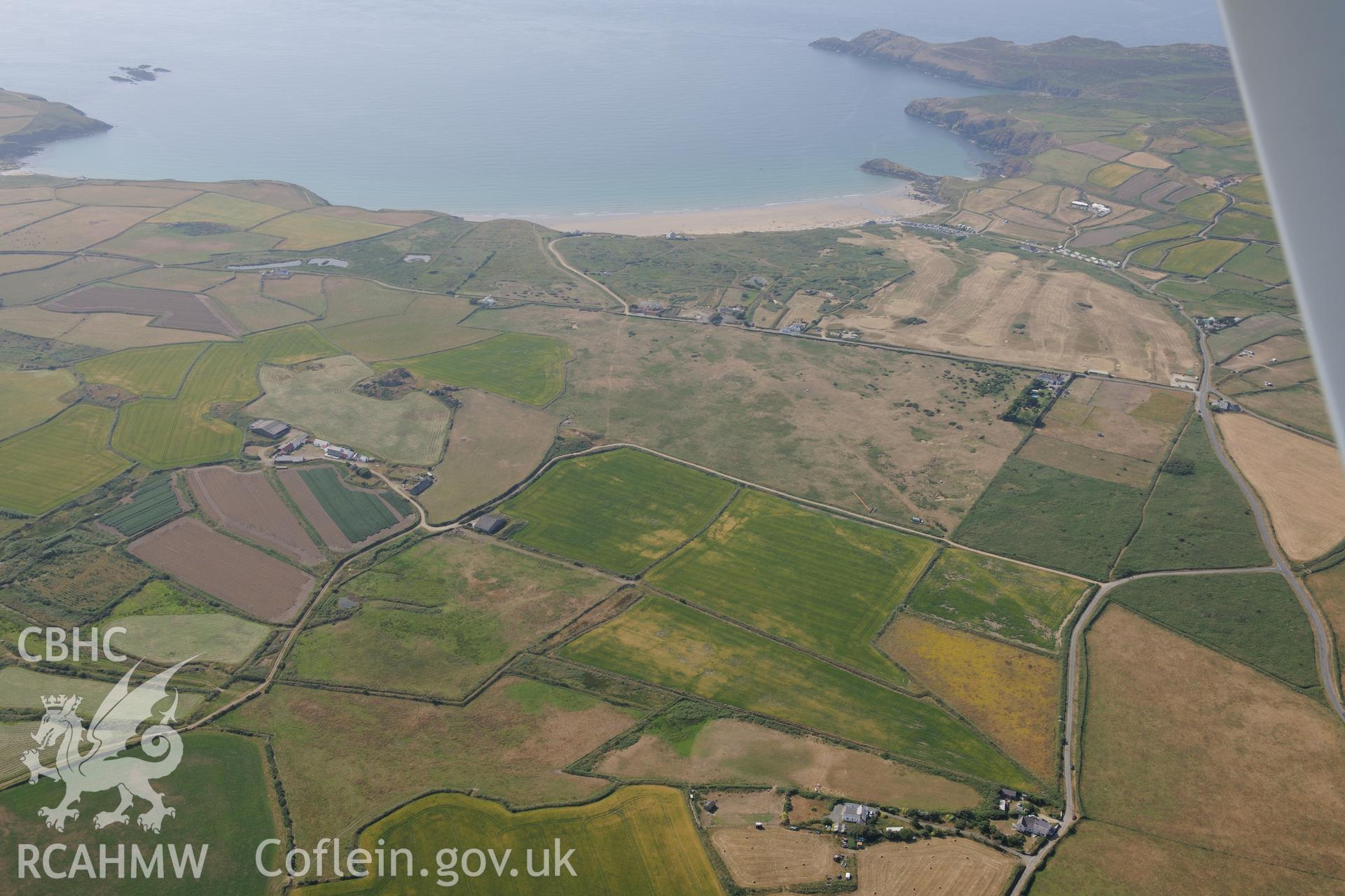 Parchmarks of possible township at Croes Phillip, St Davids. Oblique aerial photograph taken during the Royal Commission?s programme of archaeological aerial reconnaissance by Toby Driver on 16th July 2013.