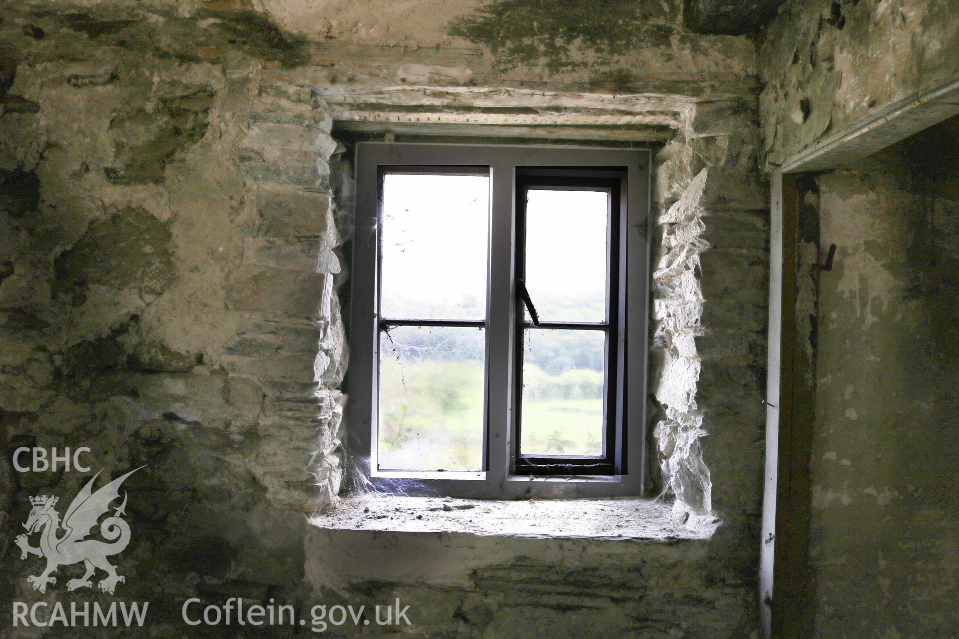 Photograph showing interior view of barn and cottage window at Maes yr Hendre, taken by Dr Marian Gwyn, 6th July 2016. (Original Reference no. 0078)